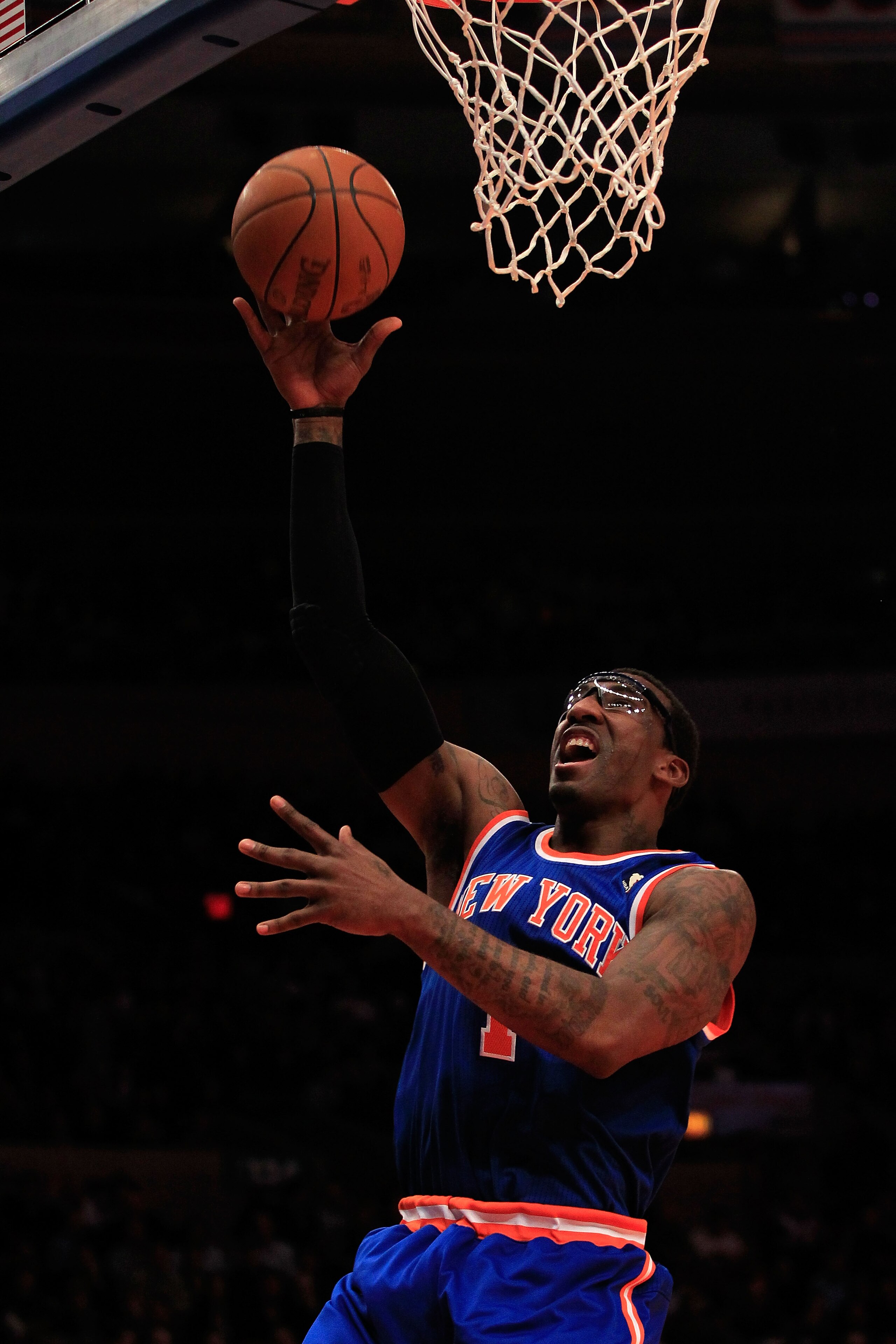 NEW YORK, NY - FEBRUARY 16:  Amar'e Stoudemire #1 of the New York Knicks lays the ball up against the Atlanta Hawks at Madison Square Garden on February 16, 2011 in New York City. NOTE TO USER: User expressly acknowledges and agrees that, by downloading a