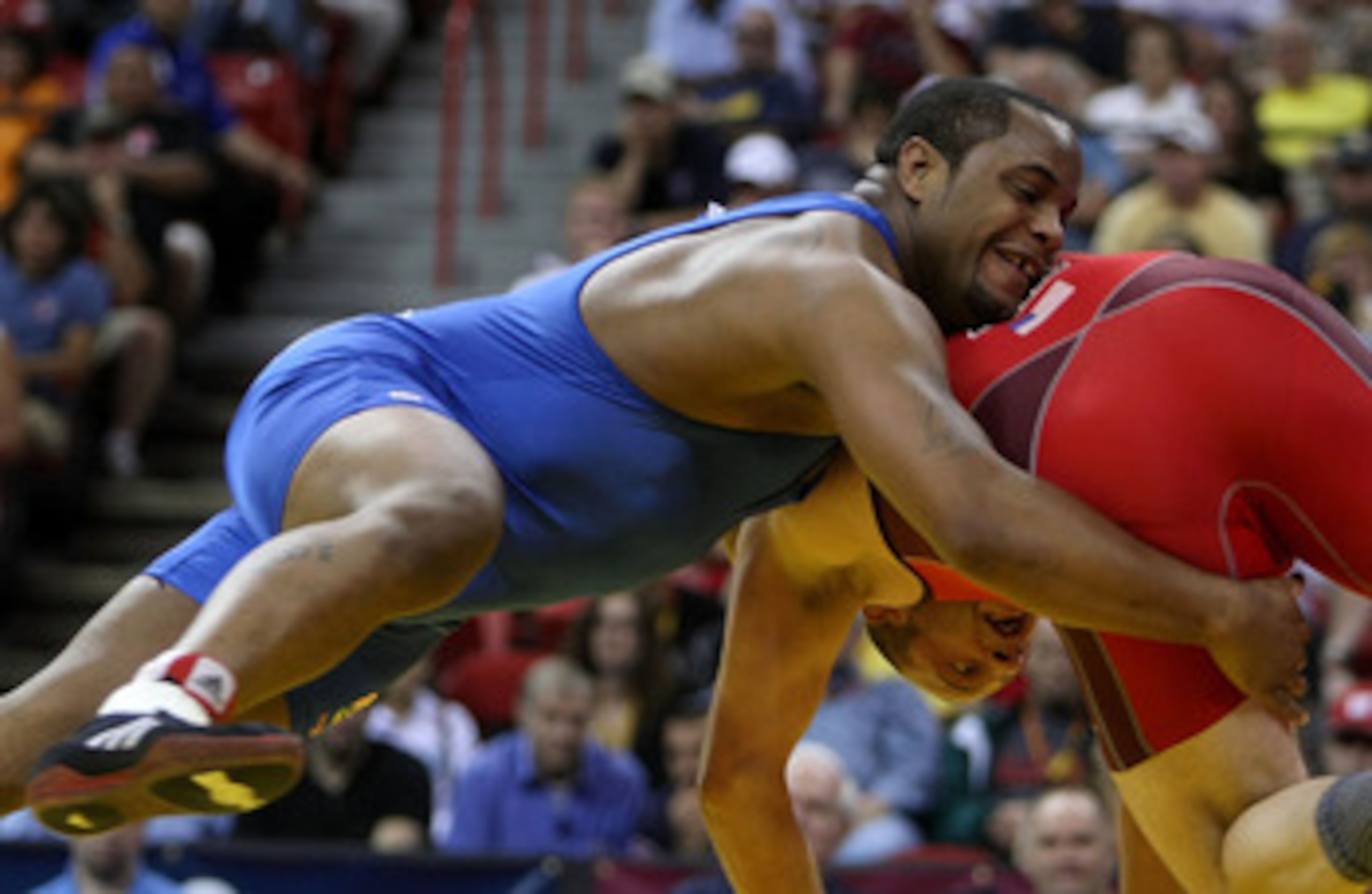 LAS VEGAS - JUNE 15: Daniel Cormier (blue) takes down Damion Hahn (red) in the Freestyle 96kg division championship match during the USA Olympic trials for wrestling and judo on June 15, 2008 at the Thomas & Mack Center in Las Vegas, Neveda. (Photo by J LAS VEGAS - JUNE 15: Daniel Cormier (blue) takes down Damion Hahn (red) in the Freestyle 96kg division championship match during the USA Olympic trials for wrestling and judo on June 15, 2008 at the Thomas & Mack Center in Las Vegas, Neveda. (Photo by J