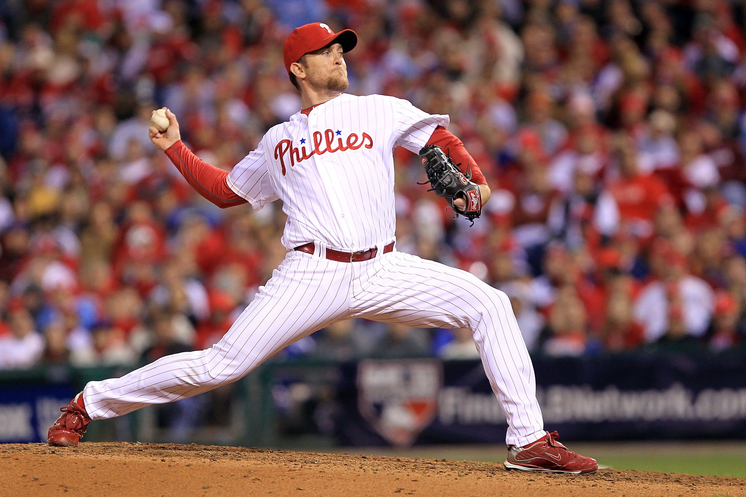PHILADELPHIA - OCTOBER 16:  Brad Lidge #54 of the Philadelphia Phillies pitches in the ninth inning against the San Francisco Giants in Game One of the NLCS during the 2010 MLB Playoffs at Citizens Bank Park on October 16, 2010 in Philadelphia, Pennsylvan