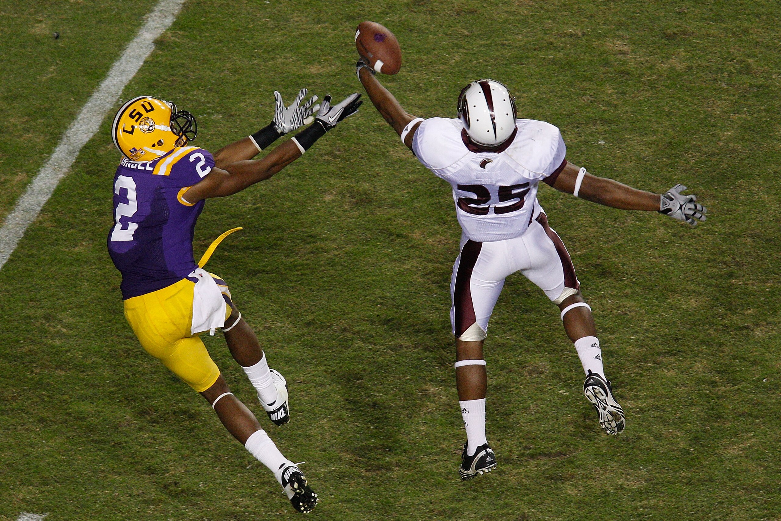 BATON ROUGE, LA - NOVEMBER 13:  Isiah Newsome #25 of the University of Louisiana-Monroe Warhawks breaks up a pass intended for Rueben Randle #2 of the Louisiana State University Tigers at Tiger Stadium on November 13, 2010 in Baton Rouge, Louisiana.  The