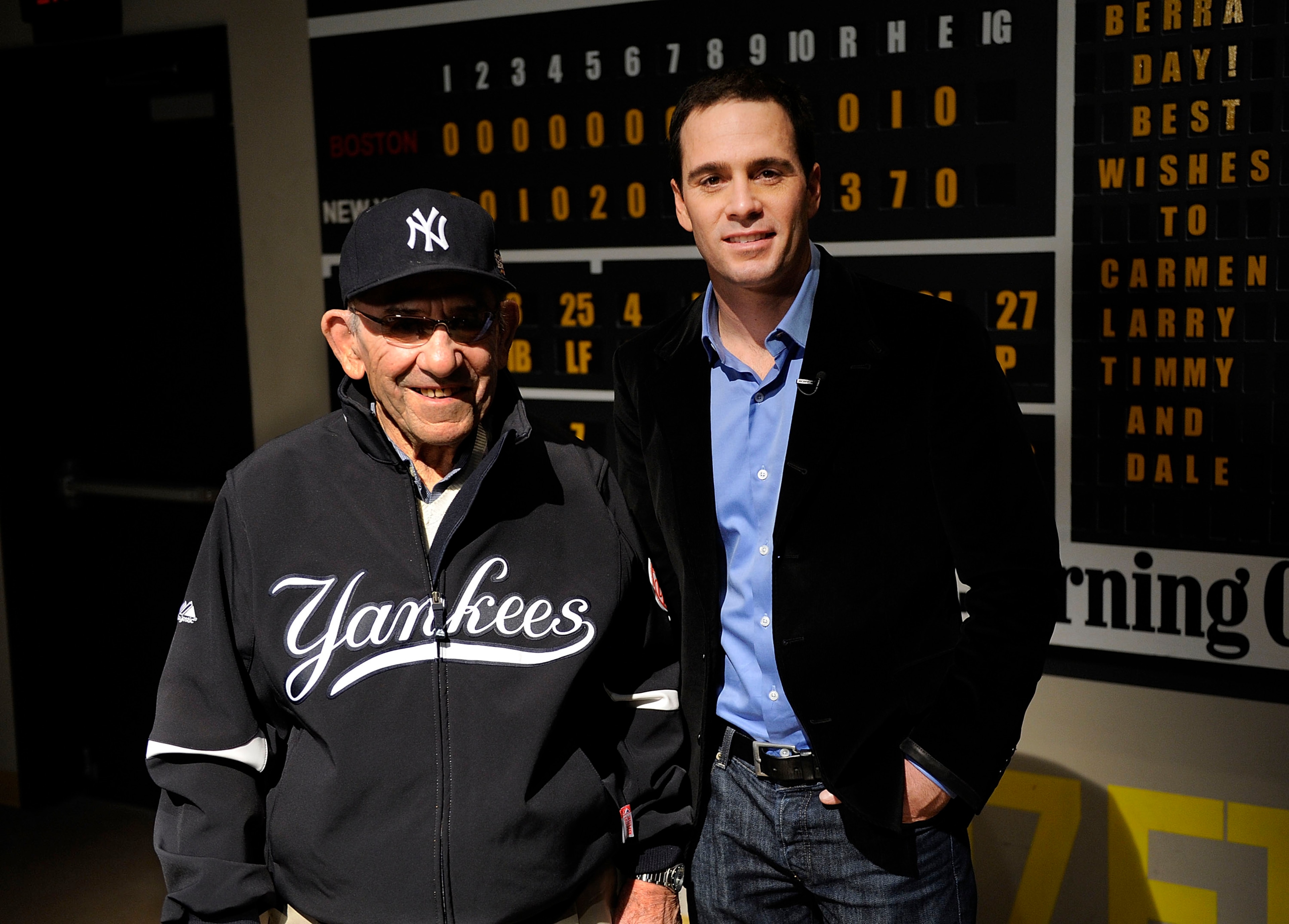 LITTLE FALLS, NJ - NOVEMBER 23: Baseball Hall of Famer Yogi Berra and four-time Nascar champion Jimmie Johnson pose for a picture in the theater at the Yogi Berra Museum and and Learning Center on November 23, 2009 in Little Falls, New Jersey. (Photo by LITTLE FALLS, NJ - NOVEMBER 23: Baseball Hall of Famer Yogi Berra and four-time Nascar champion Jimmie Johnson pose for a picture in the theater at the Yogi Berra Museum and and Learning Center on November 23, 2009 in Little Falls, New Jersey. (Photo by