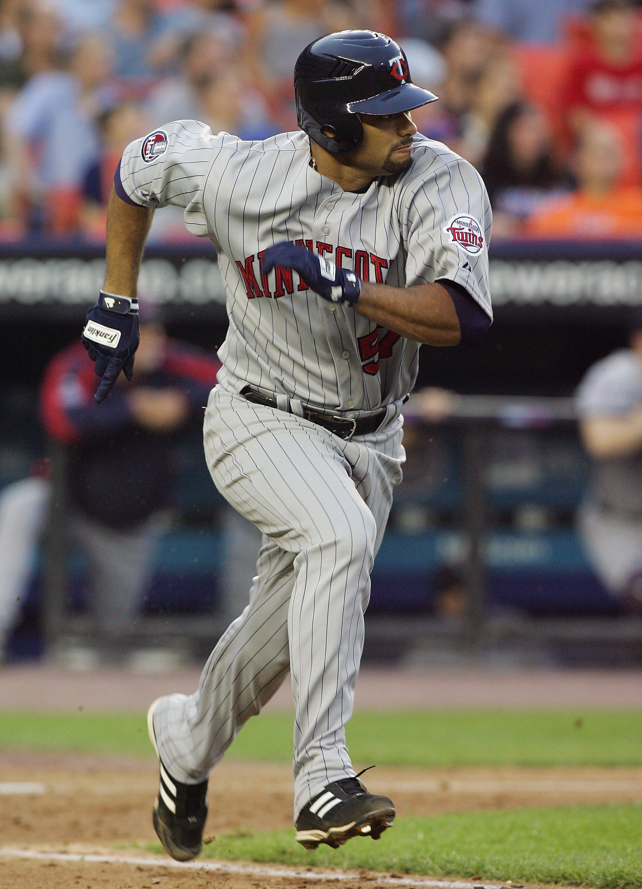 NEW YORK - JUNE 19:  Johan Santana #57 of the Minnesota Twins runs the bases gainst the New York Mets during their interleague game at Shea Stadium June 19, 2007 in the Flushing neighborhood of the Queens borough of New York City. (Photo by Jim McIsaac/Ge