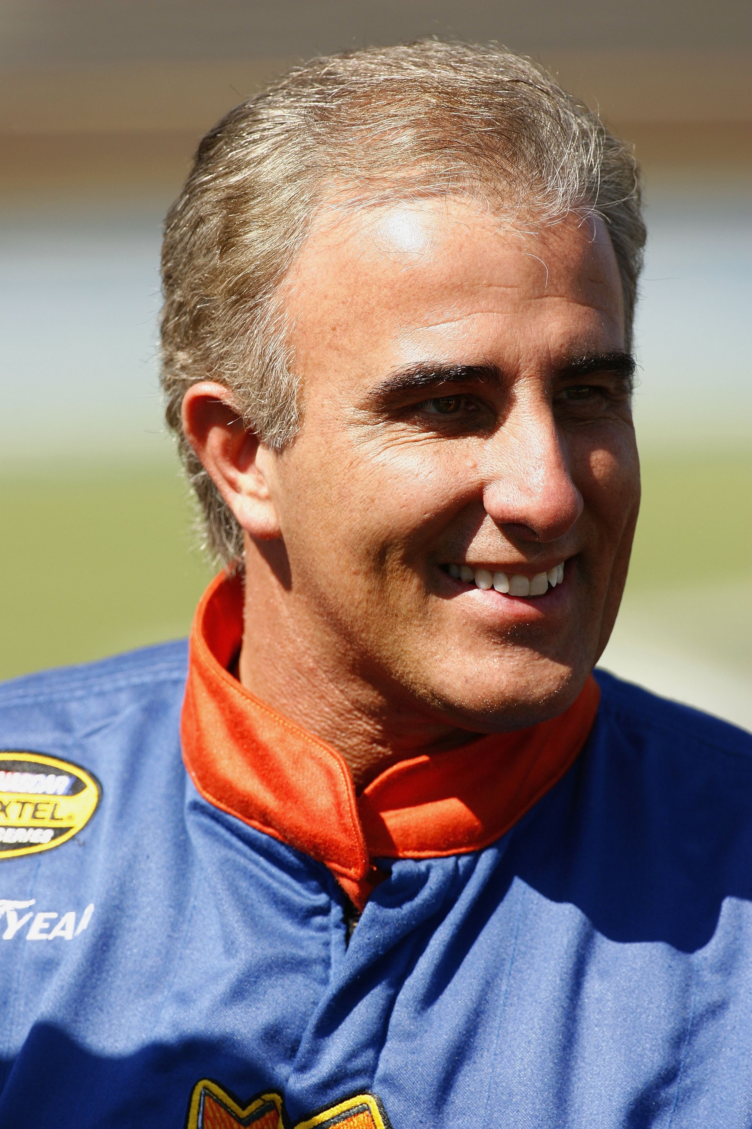 TALLADEGA, AL - OCTOBER 07:  Derrike Cope, driver of the #74 Sundance Vacations/Royal Admin Service Dodge,  looks on while waiting to qualifying for the NASCAR Nextel Cup Series Ford 500 on October 7, 2006 at Talladega Superspeedway in Talladega, Alabama.