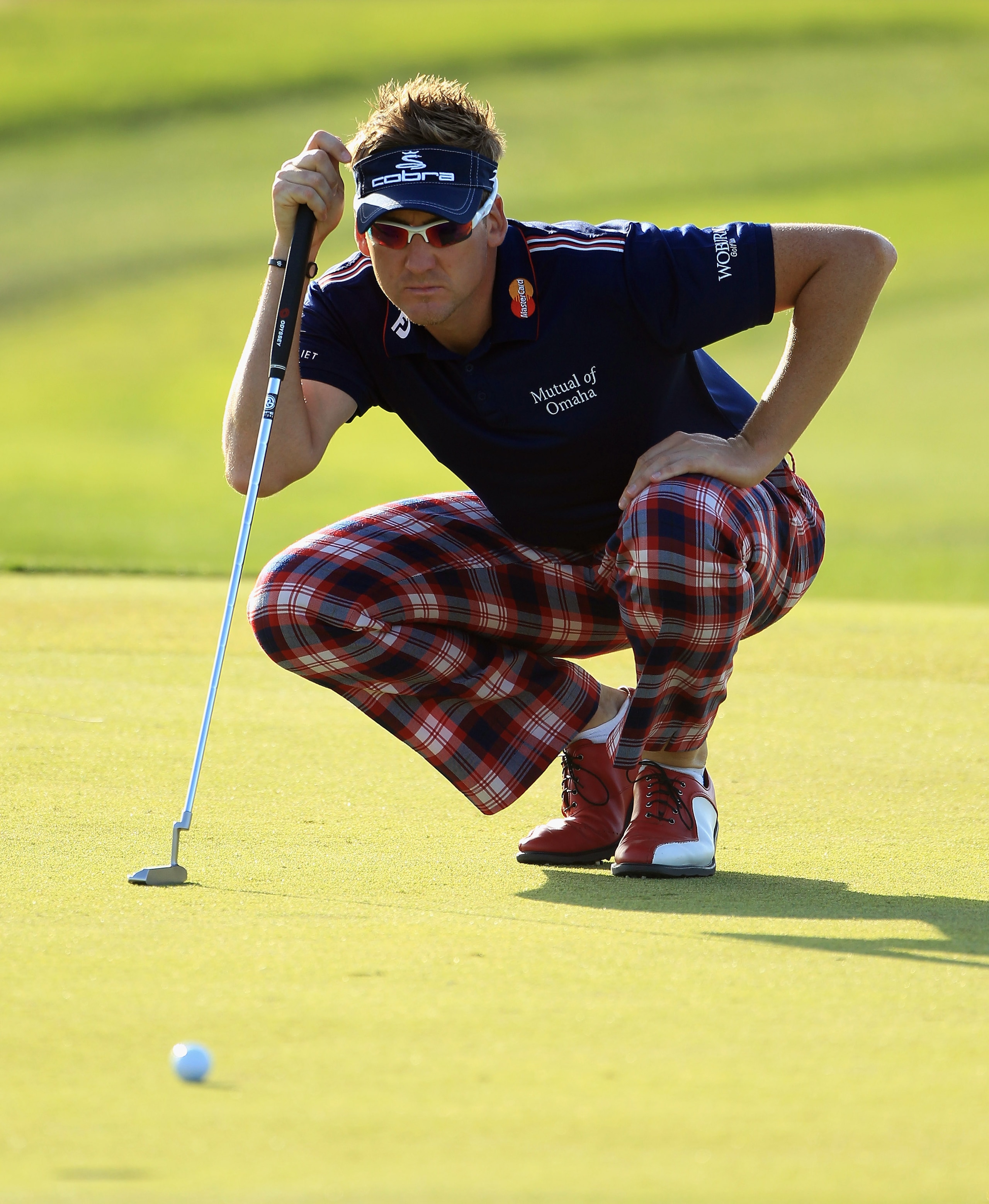 DOHA, QATAR - FEBRUARY 04:  Ian Poulter of England in action during the second round of the Commercialbank Qatar Masters held at Doha Golf Club on February 4, 2011 in Doha, Qatar.  (Photo by Andrew Redington/Getty Images)