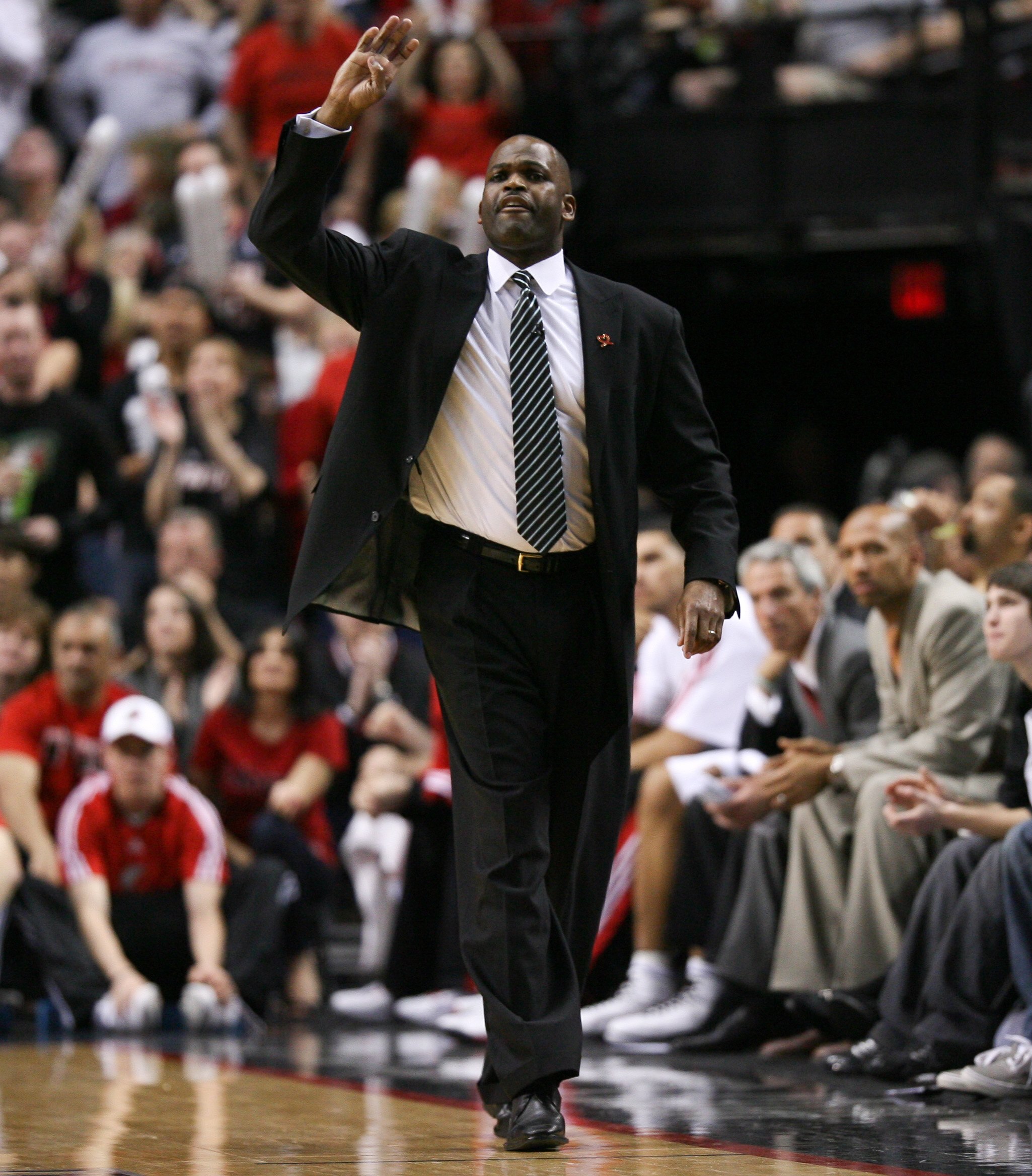 PORTLAND, OR - APRIL 24:  Head coach Nate McMillan of the Portland Trail Blazers calls a play against the Phoenix Suns during Game Four of the Western Conference Quarterfinals of the NBA Playoffs on April 24, 2010 at the Rose Garden in Portland, Oregon. N