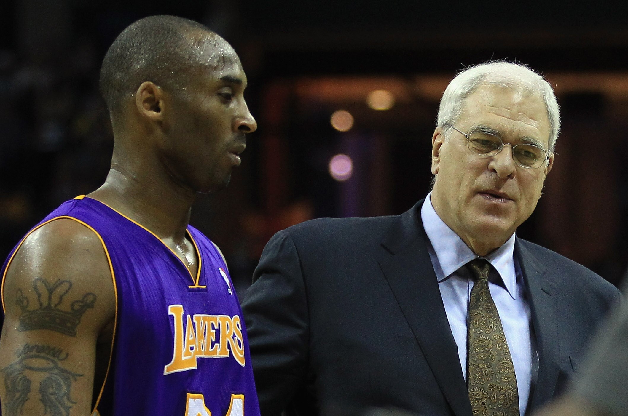 CHARLOTTE, NC - FEBRUARY 14:  Head coach Phil Jackson talks to Kobe Bryant #24 of the Los Angeles Lakers during their game against the Charlotte Bobcats at Time Warner Cable Arena on February 14, 2011 in Charlotte, North Carolina. NOTE TO USER: User expre