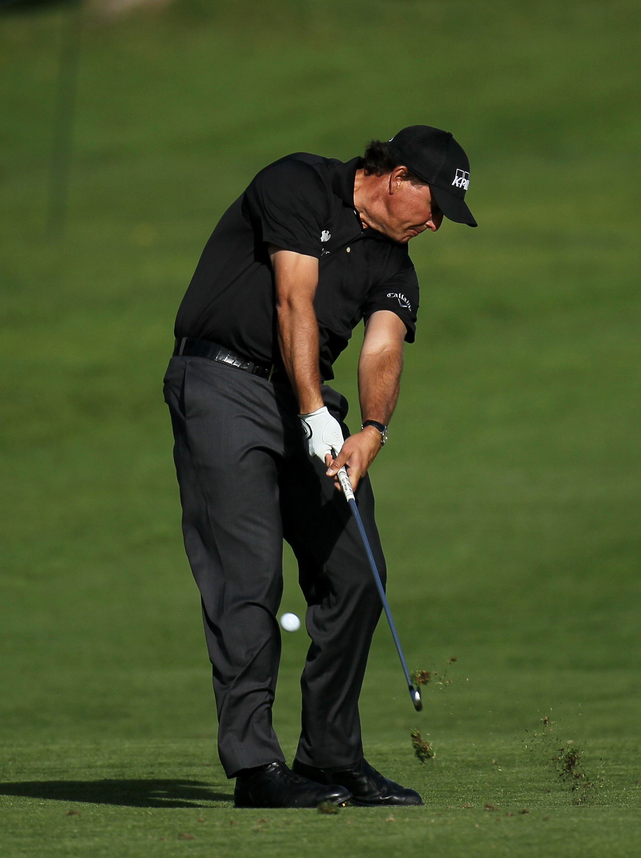 PACIFIC PALISADES, CA - FEBRUARY 17:  Phil Mickelson hits his second shot on the second hole during round one of the Northern Trust Open at Riviera Counrty Club on February 17, 2011 in Pacific Palisades, California.  (Photo by Stephen Dunn/Getty Images)