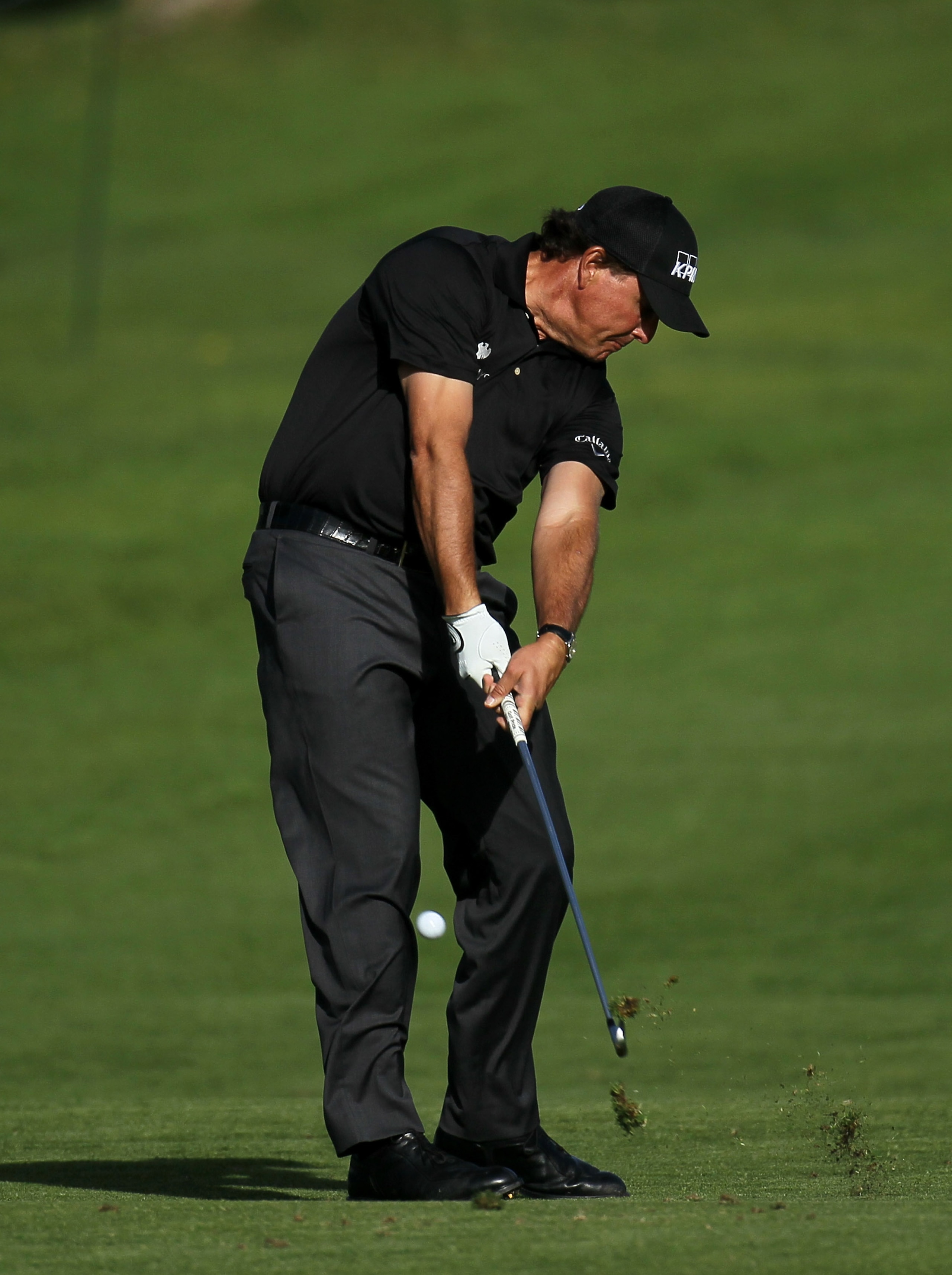 PACIFIC PALISADES, CA - FEBRUARY 17:  Phil Mickelson hits his second shot on the second hole during round one of the Northern Trust Open at Riviera Counrty Club on February 17, 2011 in Pacific Palisades, California.  (Photo by Stephen Dunn/Getty Images)