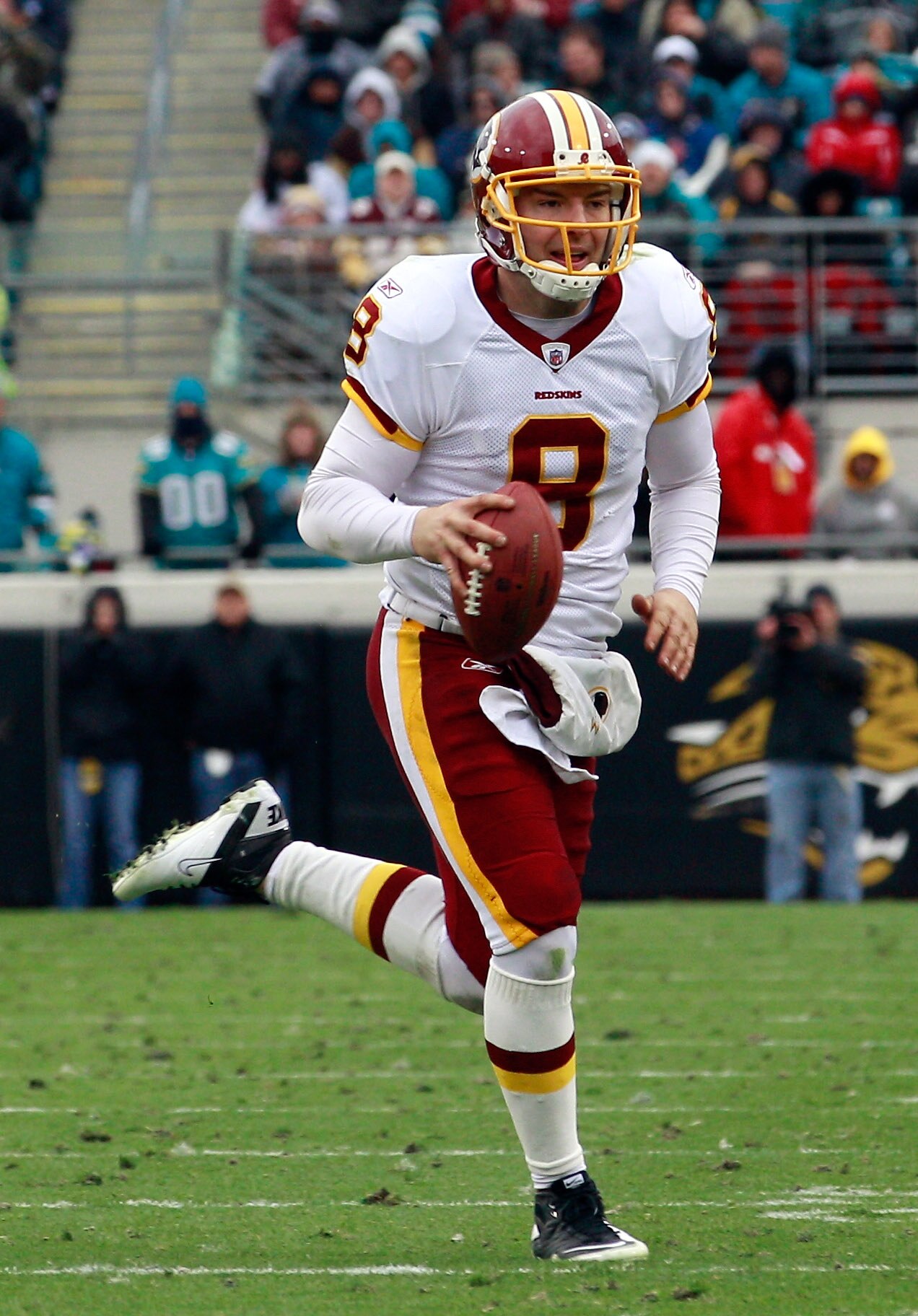 JACKSONVILLE, FL - DECEMBER 26:  Quarterback Rex Grossman #8 of the Washington Redskins scrambles for yardage during the game against the Jacksonville Jaguars at EverBank Field on December 26, 2010 in Jacksonville, Florida.  (Photo by Sam Greenwood/Getty