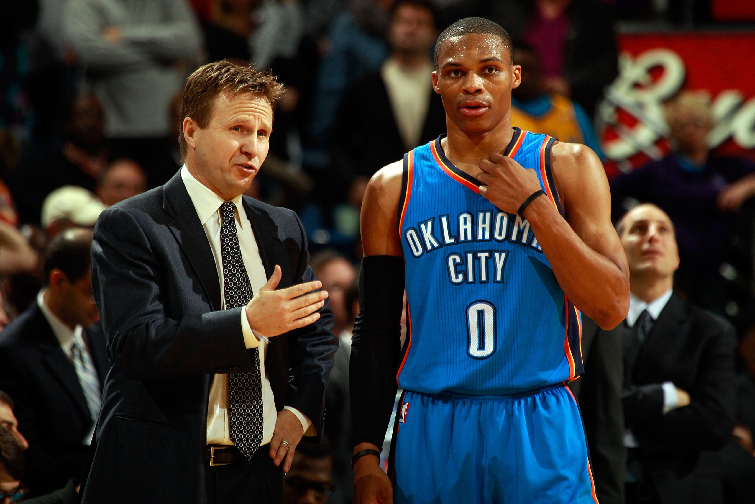 NEW ORLEANS, LA - DECEMBER 10: Head coach Scott Brooks talks with Russell Westbrook #0 of the Oklahoma City Thunder during the game against the New Orleans Hornets at New Orleans Arena on December 10, 2010 in New Orleans, Louisiana. NOTE TO USER: User NEW ORLEANS, LA - DECEMBER 10: Head coach Scott Brooks talks with Russell Westbrook #0 of the Oklahoma City Thunder during the game against the New Orleans Hornets at New Orleans Arena on December 10, 2010 in New Orleans, Louisiana. NOTE TO USER: User