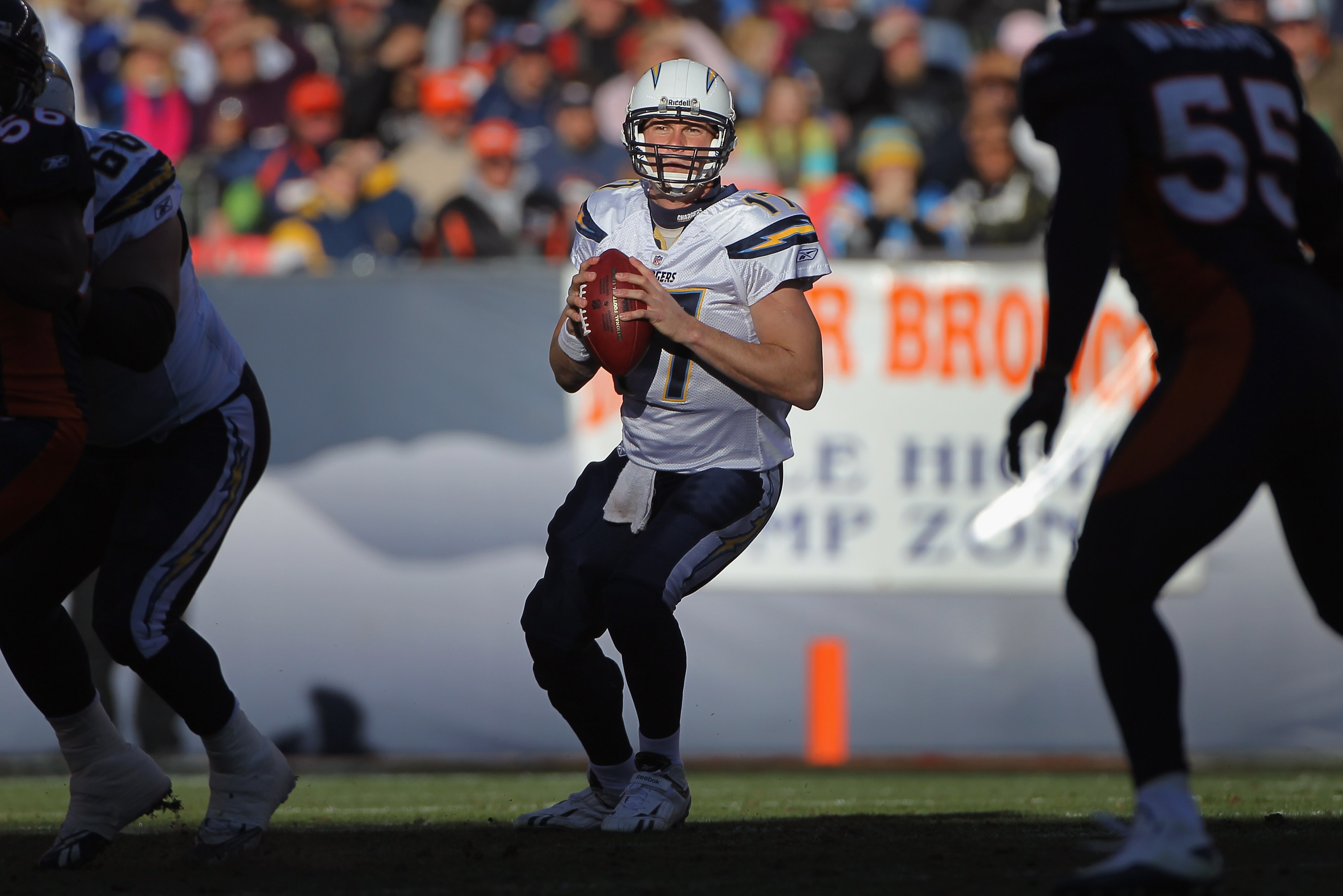 DENVER - JANUARY 02:  Quarterback Philip Rivers #17 of the San Diego Chargers looks to deliver a pass against the Denver Broncos at INVESCO Field at Mile High on January 2, 2011 in Denver, Colorado. The Chargers defeated the Broncos 33-28.  (Photo by Doug