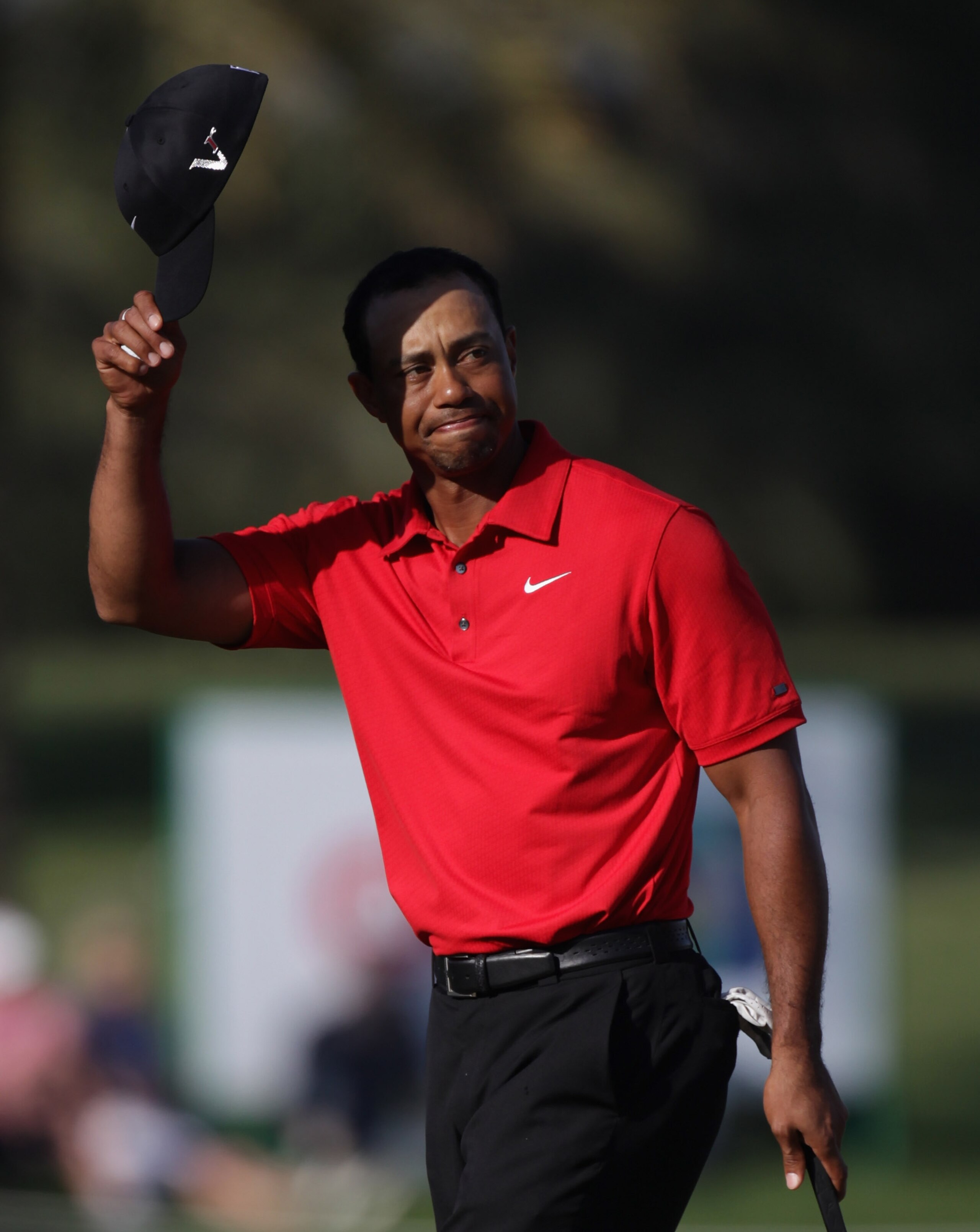DUBAI, UNITED ARAB EMIRATES - FEBRUARY 13:  Tiger Woods of the USA during the final round of the Omega Dubai Desert Classic on the Majlis course at the Emirates Golf Club on February 13, 2011 in Dubai, United Arab Emirates.  (Photo by Ross Kinnaird/Getty