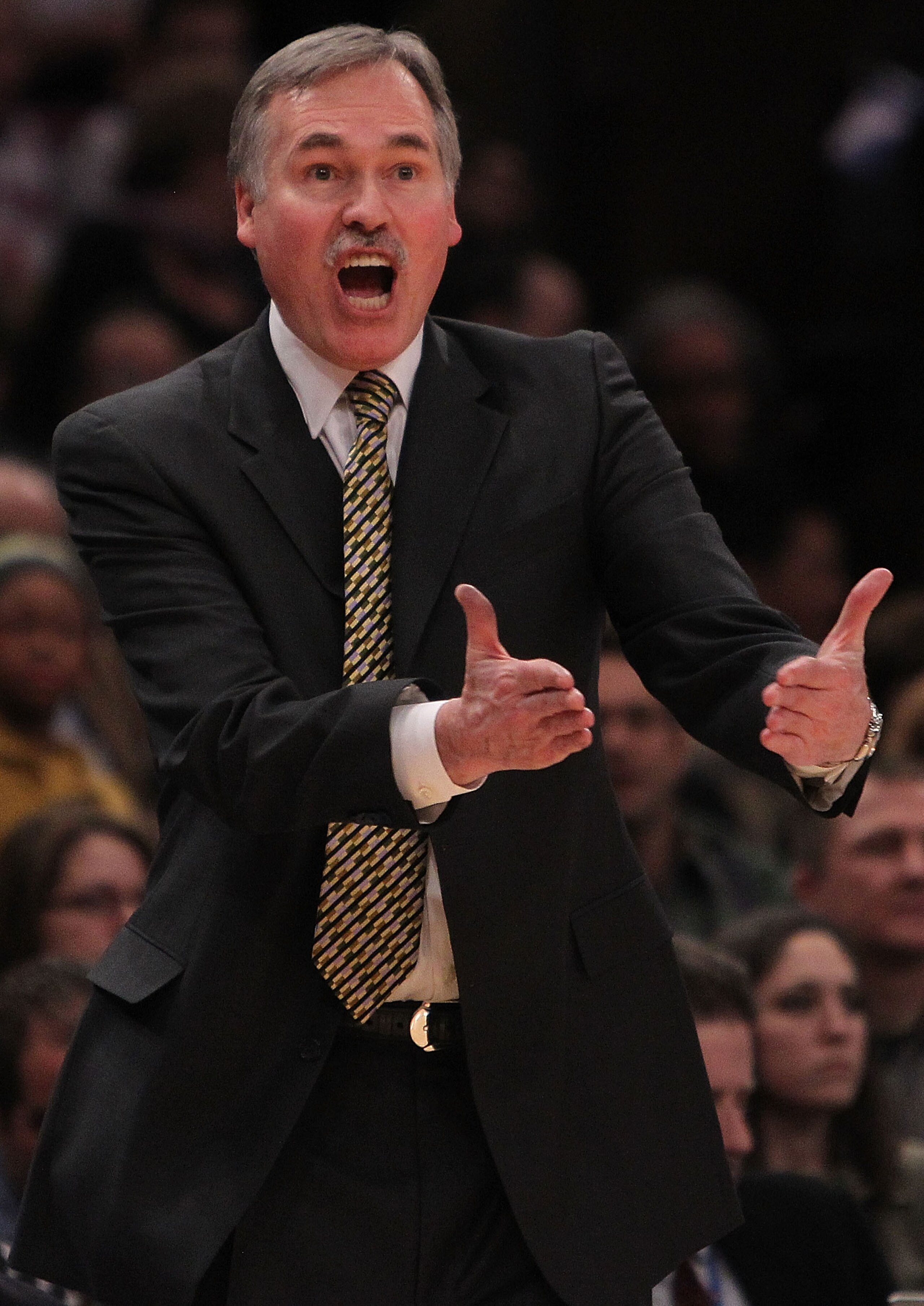 NEW YORK, NY - FEBRUARY 02: Head coach of the New York Knicks, Mike D'Antoni gestures from the bench against the Dallas Mavericks at Madison Square Garden on February 2, 2011 in New York City. NOTE TO USER: User expressly acknowledges and agrees that, by NEW YORK, NY - FEBRUARY 02: Head coach of the New York Knicks, Mike D'Antoni gestures from the bench against the Dallas Mavericks at Madison Square Garden on February 2, 2011 in New York City. NOTE TO USER: User expressly acknowledges and agrees that, by