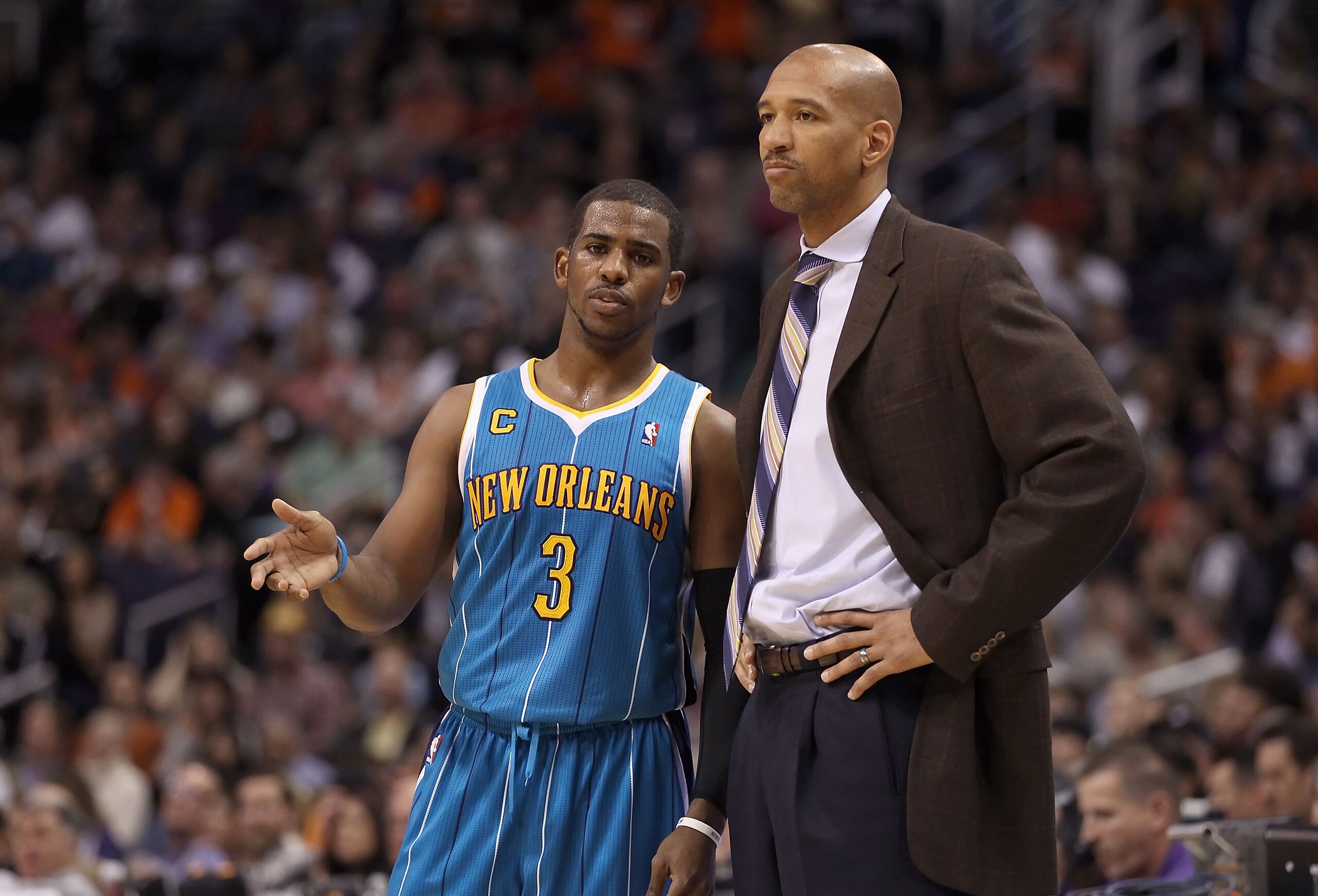 PHOENIX, AZ - JANUARY 30: Chris Paul #3 of the New Orleans Hornets talks with head coach Monty Williams during the NBA game against the Phoenix Suns at US Airways Center on January 30, 2011 in Phoenix, Arizona. The Suns defeated the Hornets 104-102. NOTE PHOENIX, AZ - JANUARY 30: Chris Paul #3 of the New Orleans Hornets talks with head coach Monty Williams during the NBA game against the Phoenix Suns at US Airways Center on January 30, 2011 in Phoenix, Arizona. The Suns defeated the Hornets 104-102. NOTE