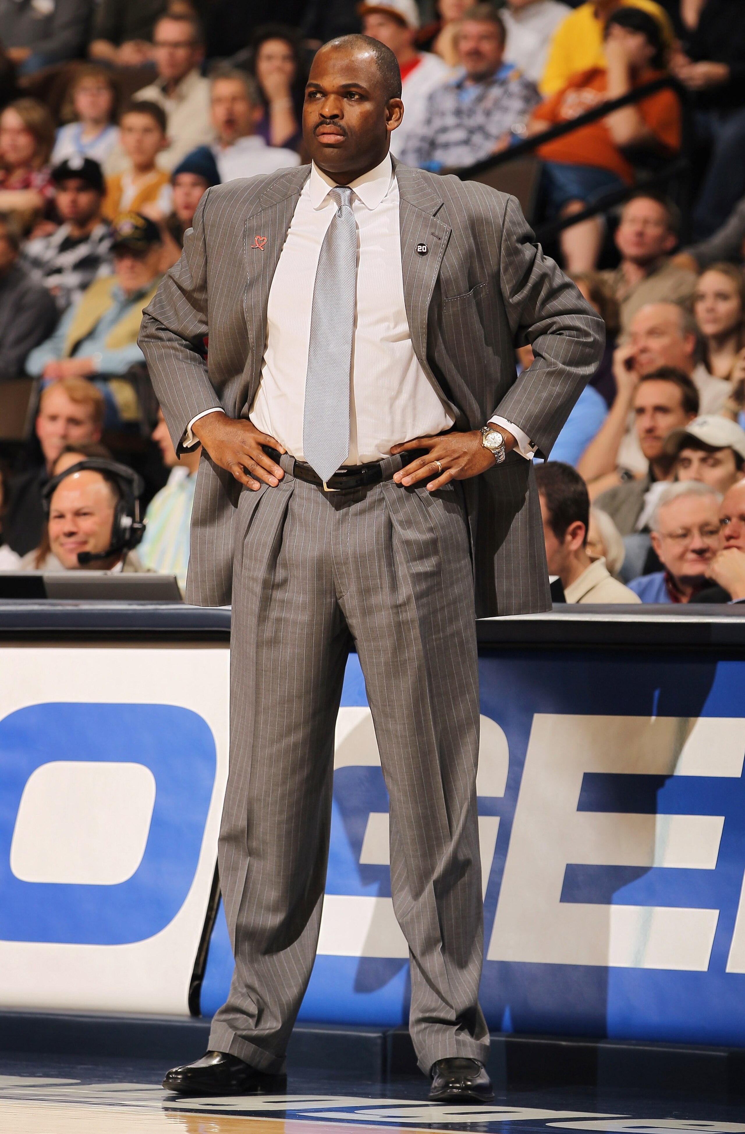 DENVER - DECEMBER 28: Head coach Nate McMillan of the Portland Trail Blazers leads his team against the Denver Nuggets at Pepsi Center on December 28, 2010 in Denver, Colorado. The Nuggets defeated the Blazers 95-77. NOTE TO USER: User expressly acknowle DENVER - DECEMBER 28: Head coach Nate McMillan of the Portland Trail Blazers leads his team against the Denver Nuggets at Pepsi Center on December 28, 2010 in Denver, Colorado. The Nuggets defeated the Blazers 95-77. NOTE TO USER: User expressly acknowle
