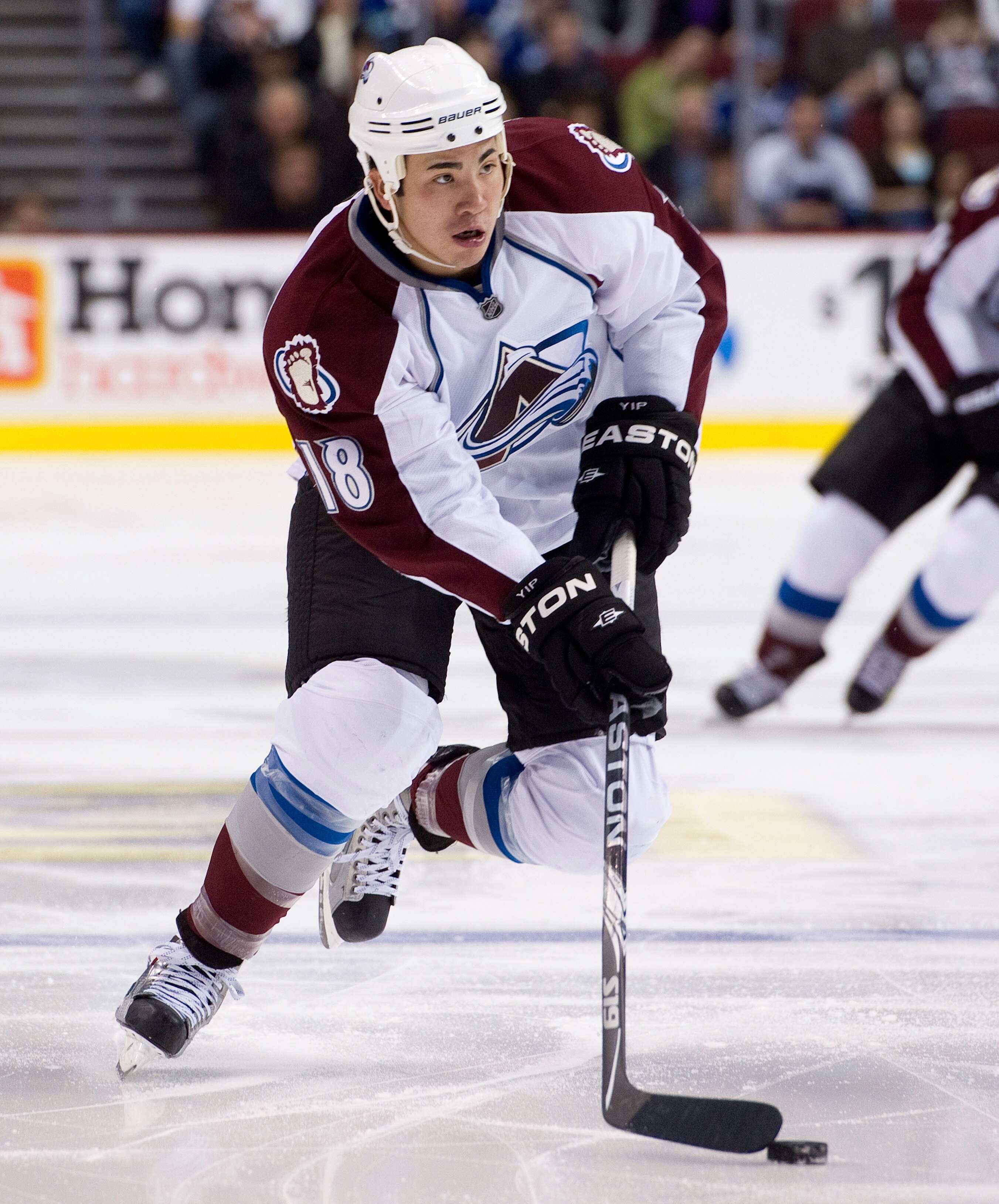 VANCOUVER, CANADA - NOVEMBER 24: Brandon Yip #18 of the Colorado Avalanche skates with the puck during NHL action against the Vancouver Canucks on November 24, 2010 at Rogers Arena in Vancouver, British Columbia, Canada.  (Photo by Rich Lam/Getty Images)