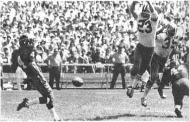 Whitsell (23) Tries To Block A Punt