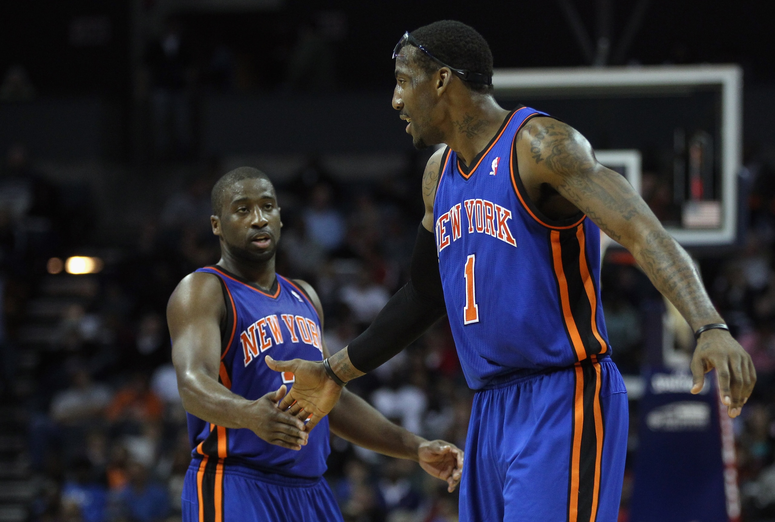 CHARLOTTE, NC - NOVEMBER 24:  Amare Stoudemire #1 of the New York Knicks and teammate Raymond Felton #2 react to a call during their game against the Charlotte Bobcats at Time Warner Cable Arena on November 24, 2010 in Charlotte, North Carolina.  NOTE TO