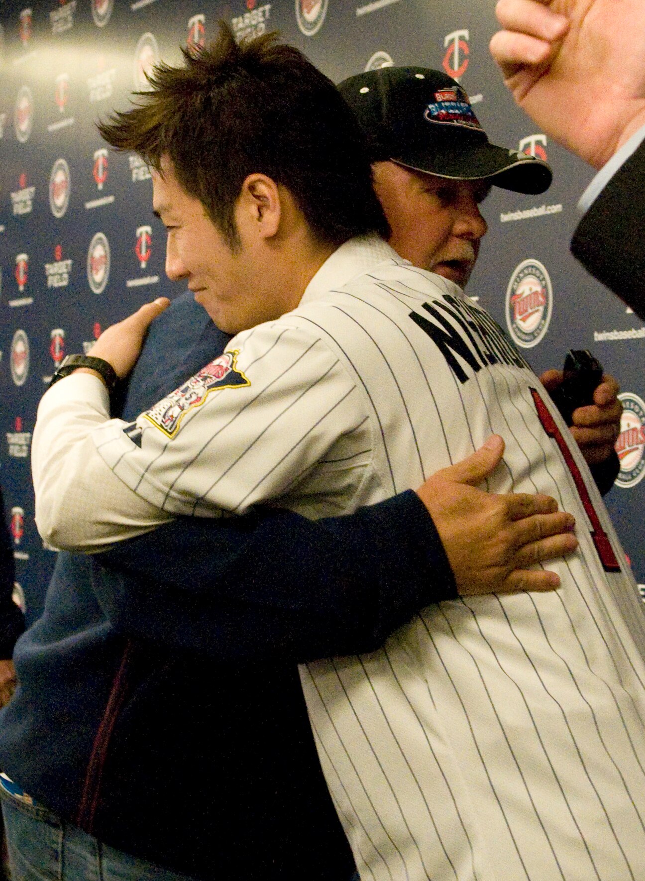 MINNEAPOLIS, MN - DECEMBER 18: Tsuyoshi Nishioka #1 of the Minnesota Twins hugs manager Ron Gardenhire following a press conference on December 18, 2010 at Target Field in Minneapolis, Minnesota. (Photo by Hannah Foslien /Getty Images)