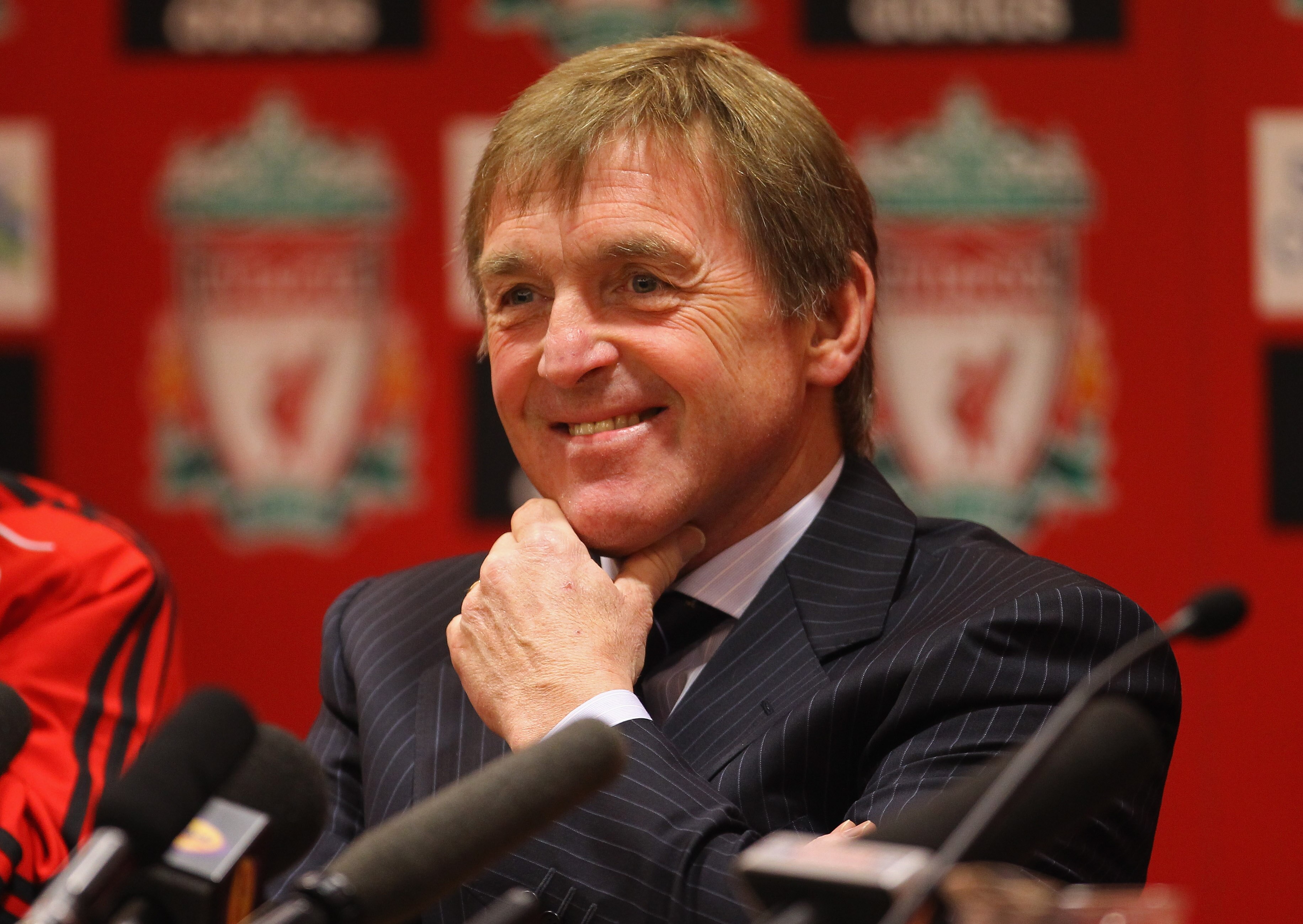 LIVERPOOL, ENGLAND - FEBRUARY 03:  Kenny Dalglish the manager of Liverpool faces the media during a press conference to introduce his new signings, Luis Suarez and Andy Carroll, at Anfield on February 3, 2011 in Liverpool, England.  (Photo by Alex Livesey