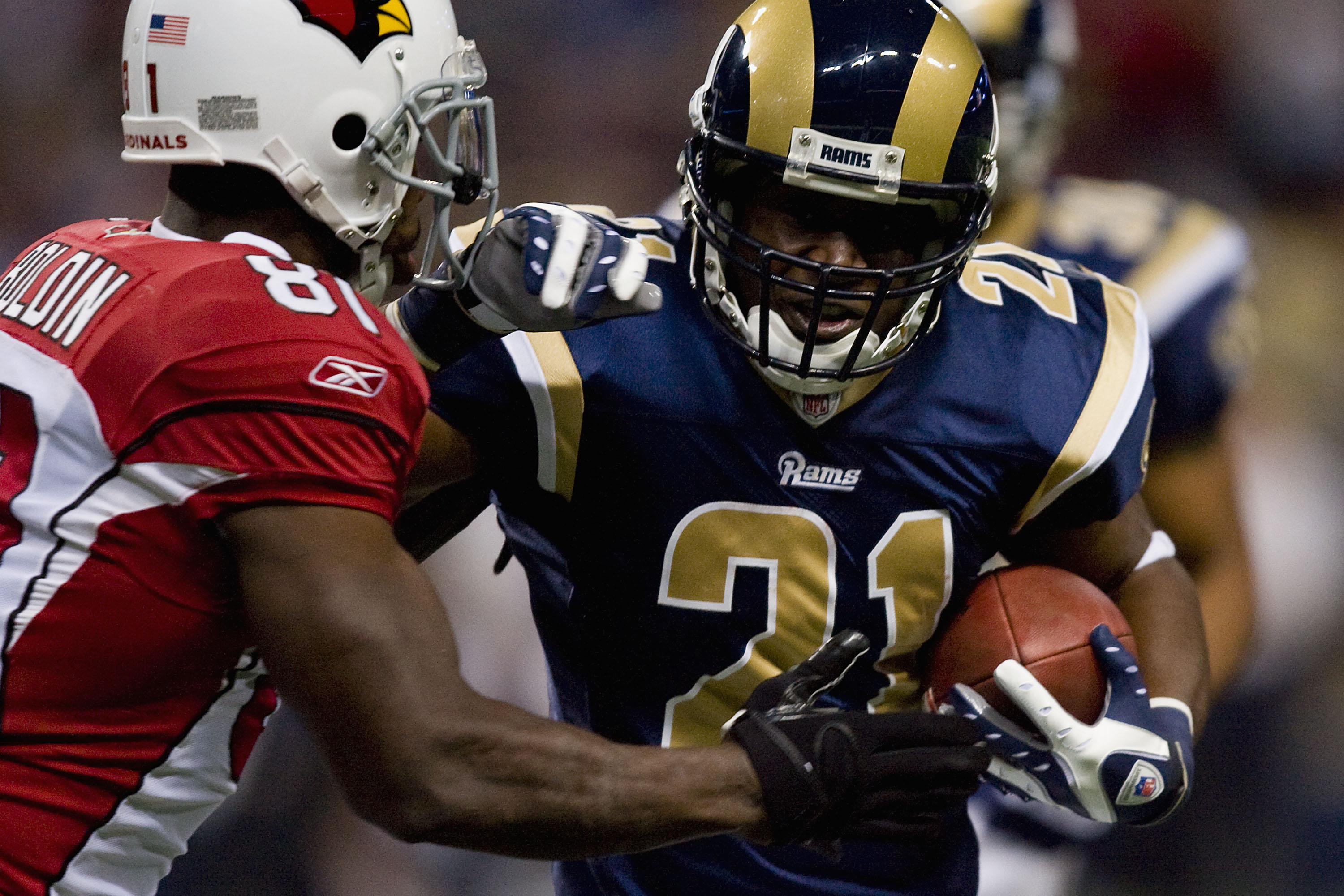 ST. LOUIS - NOVEMBER 22: Oshiomogho Atogwe #21 of the St. Louis Rams recovers a fumble against the Arizona Cardinals at the Edward Jones Dome on November 22, 2009 in St. Louis, Missouri.  The Cardinals beat the Rams 21-13.  (Photo by Dilip Vishwanat/Getty