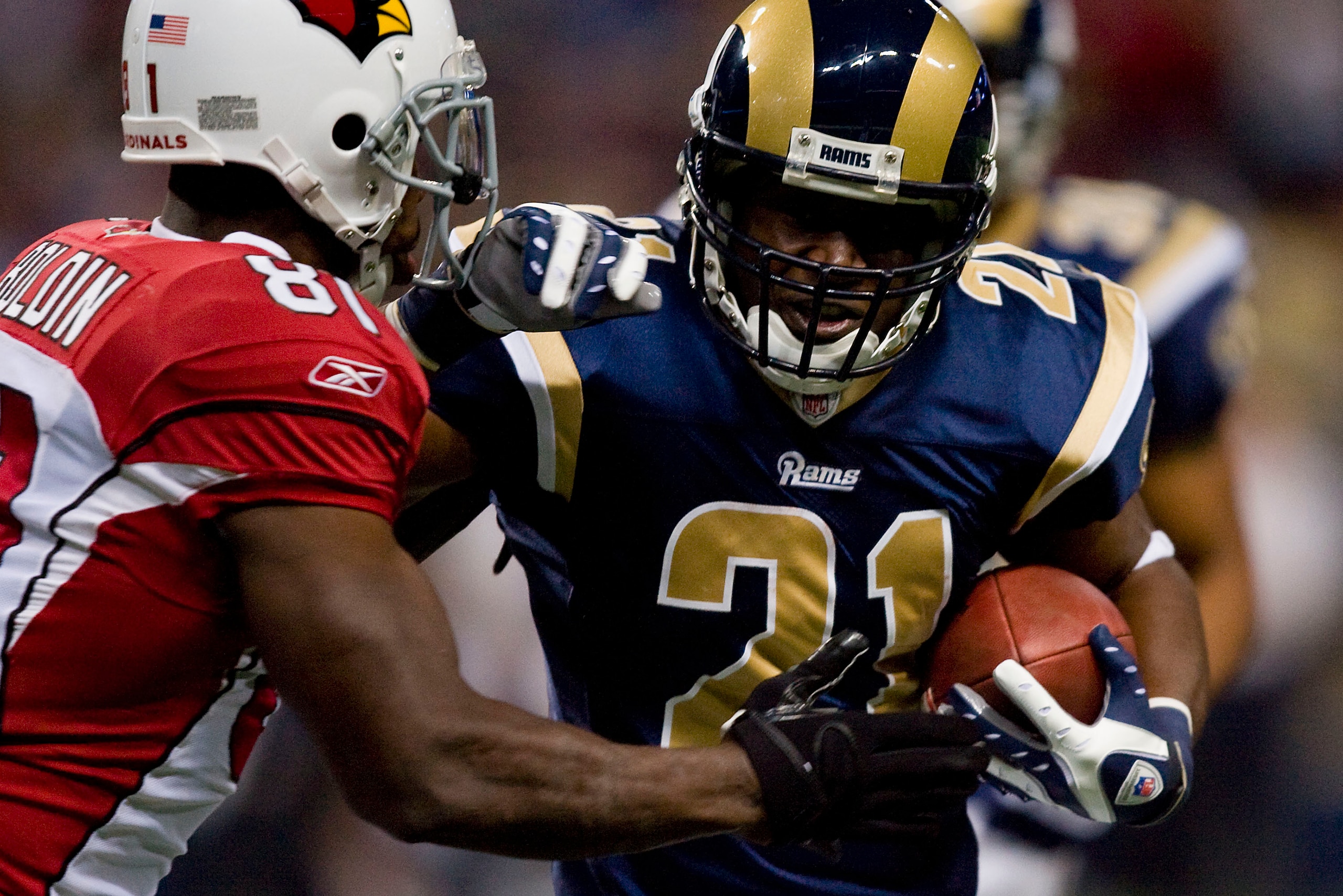 ST. LOUIS - NOVEMBER 22: Oshiomogho Atogwe #21 of the St. Louis Rams recovers a fumble against the Arizona Cardinals at the Edward Jones Dome on November 22, 2009 in St. Louis, Missouri.  The Cardinals beat the Rams 21-13.  (Photo by Dilip Vishwanat/Getty
