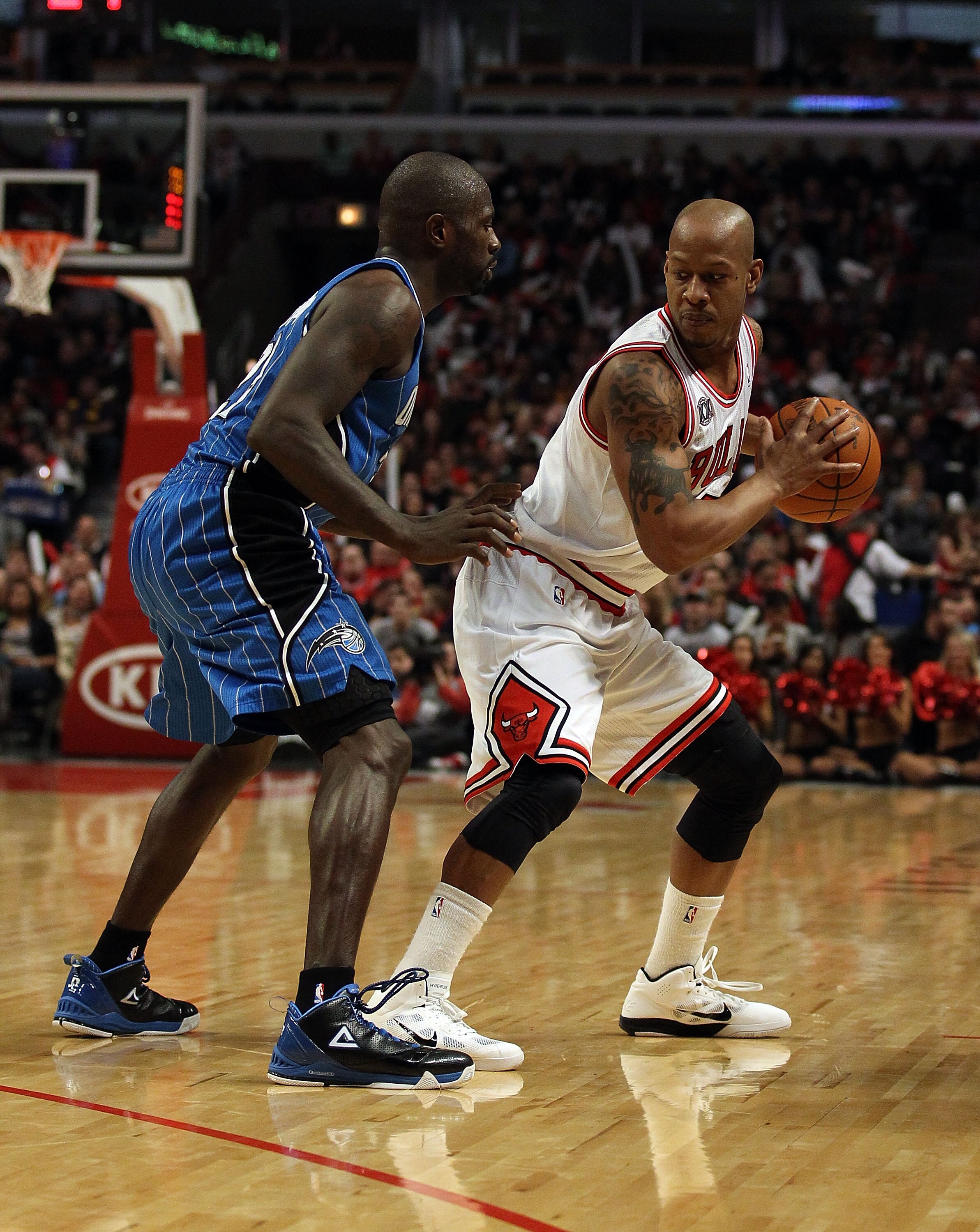CHICAGO, IL - JANUARY 28: Keith Bogans #6 of the Chicago Bulls prepares to move against Jason Richardson #23 of the Orlando Magic at the United Center on January 28, 2011 in Chicago, Illinois. The Bulls defeated the Magic 99-90. NOTE TO USER: User express