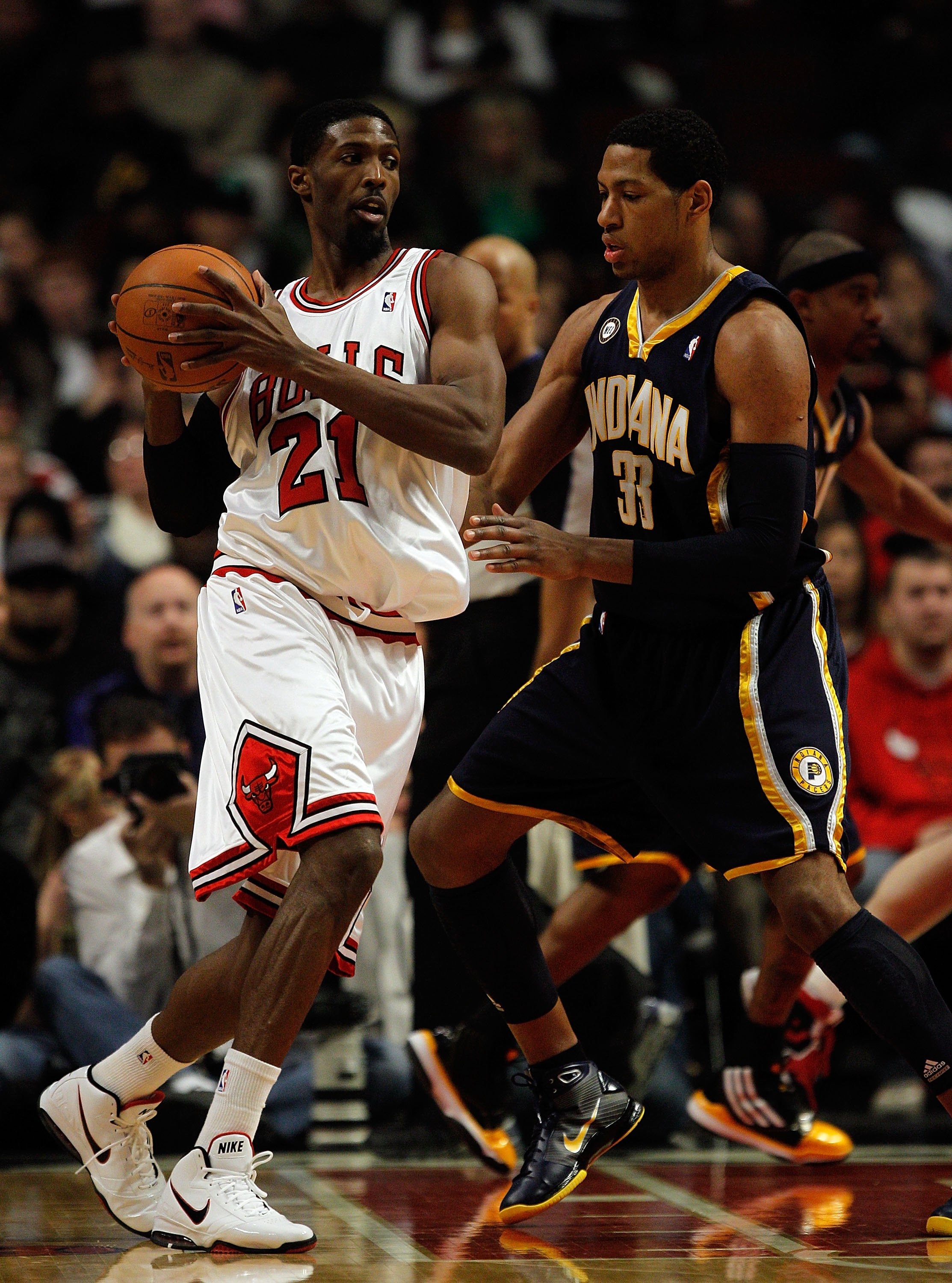 CHICAGO - FEBRUARY 24: Hakim Warrick #21 of the Chicago Bulls looks to move against Danny Granger #33 of the Indiana Pacers at the United Center on February 24, 2010 in Chicago, Illinois. The Bulls defeated the Pacers 120-110. NOTE TO USER: User expressly