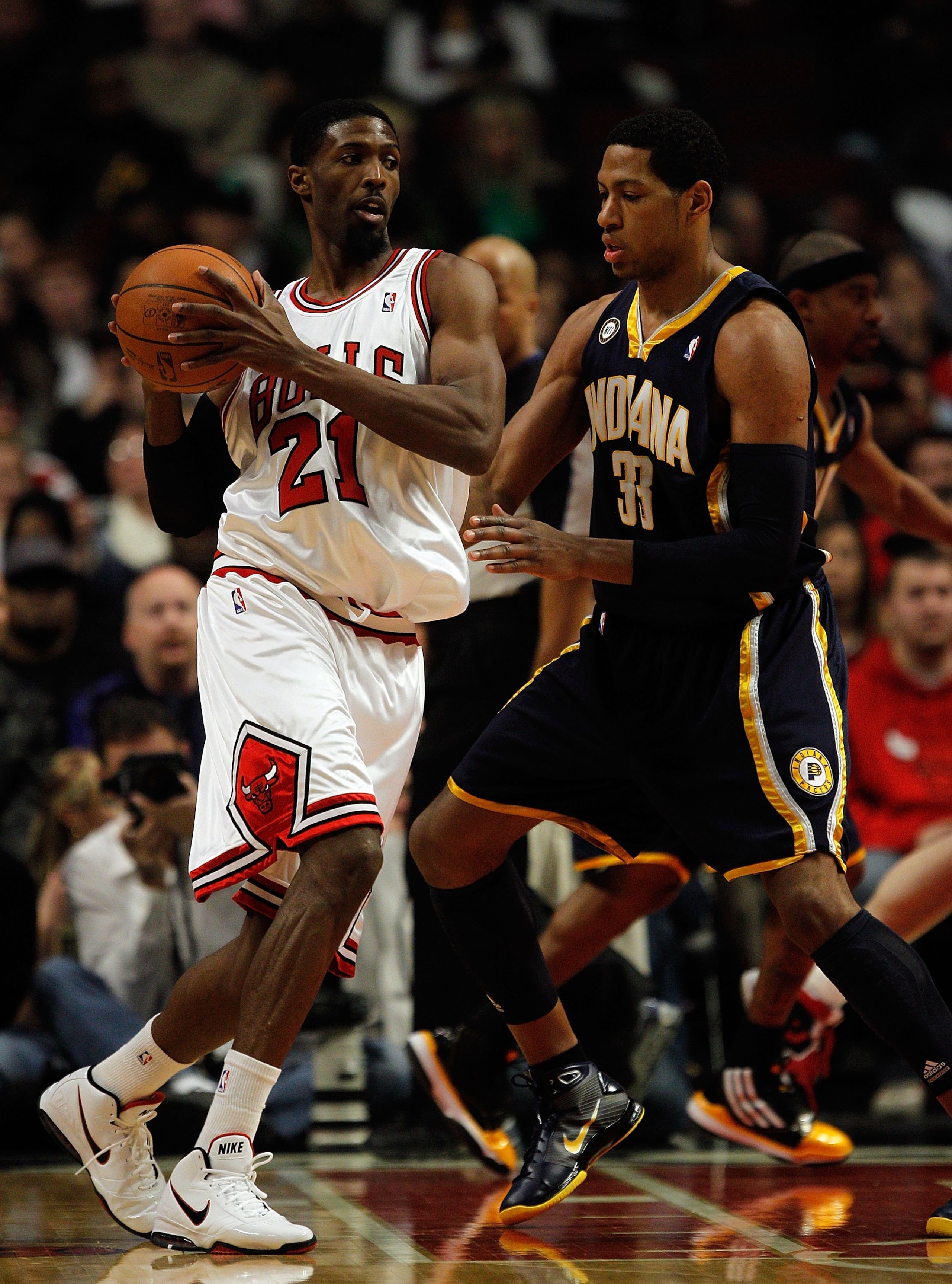CHICAGO - FEBRUARY 24: Hakim Warrick #21 of the Chicago Bulls looks to move against Danny Granger #33 of the Indiana Pacers at the United Center on February 24, 2010 in Chicago, Illinois. The Bulls defeated the Pacers 120-110. NOTE TO USER: User expressly