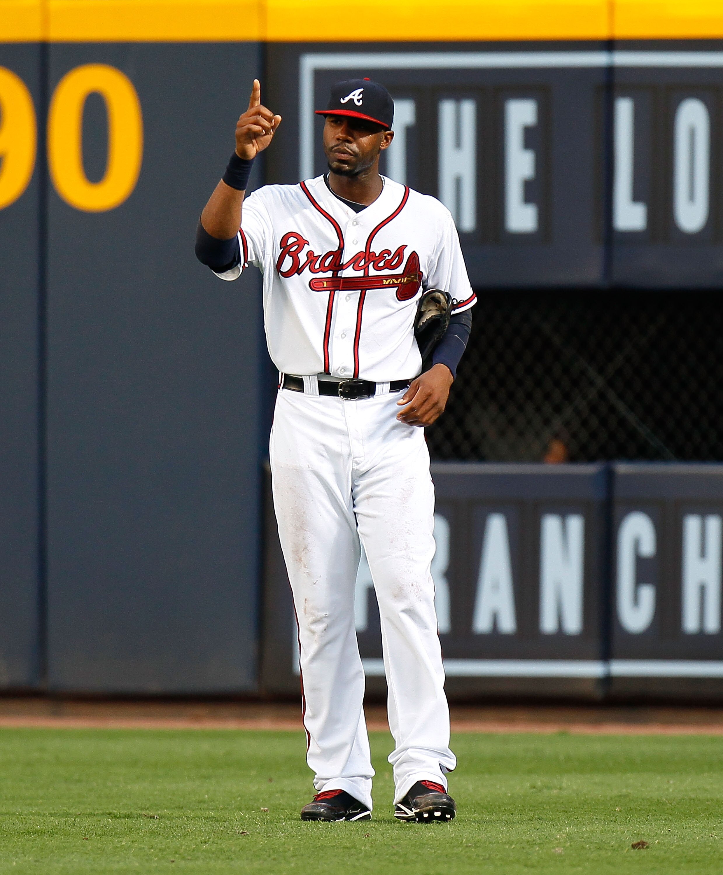 ATLANTA - JULY 15:  Jason Heyward #22 of the Atlanta Braves acknowledges the crowd after catching a deep fly ball and running into the wall in the fourth inning against the Milwaukee Brewers at Turner Field on July 15, 2010 in Atlanta, Georgia.  (Photo by