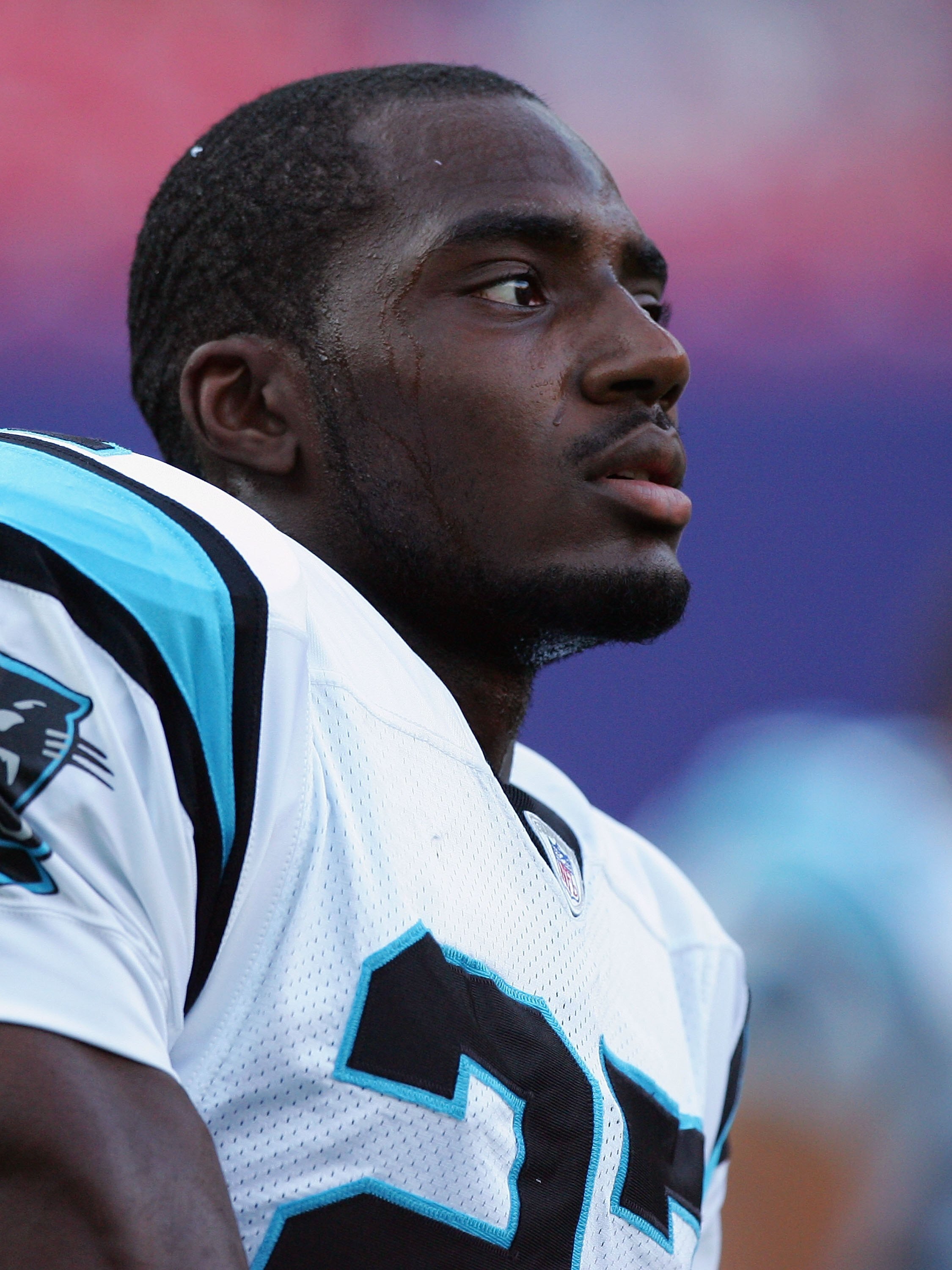 EAST RUTHERFORD, NJ - AUGUST 11: C.J. Wilson #27 of the Carolina Panthers looks on against the New York Giants on August 11, 2007 at Giants Stadium in East Rutherford, New Jersey. (Photo by Jim McIsaac/Getty Images)