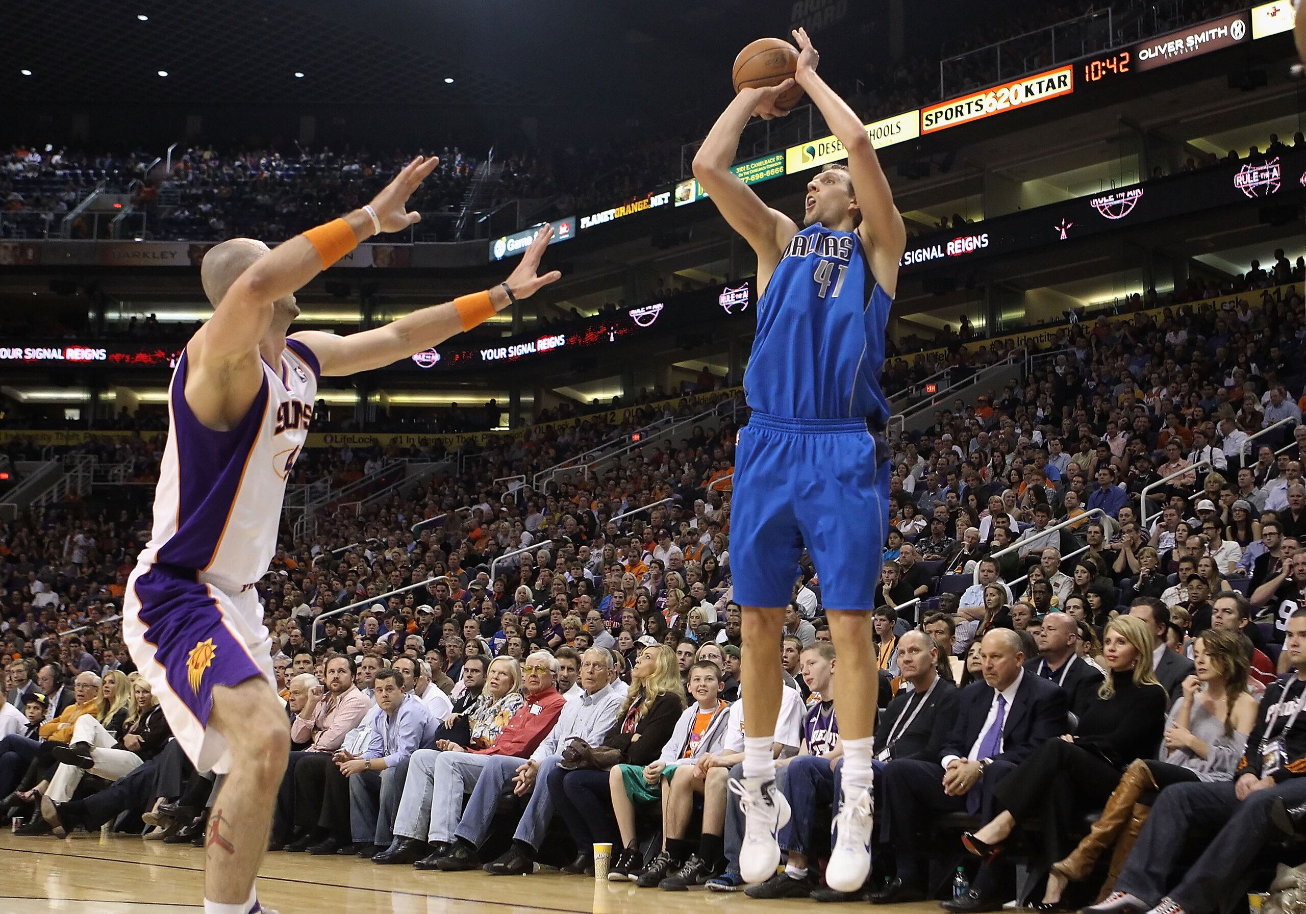 PHOENIX, AZ - FEBRUARY 17: Dirk Nowitzki #41 of the Dallas Mavericks puts up a three point shot against the Phoenix Suns during the NBA game at US Airways Center on February 17, 2011 in Phoenix, Arizona. The Mavericks defeated the Suns 112-106. NOTE TO PHOENIX, AZ - FEBRUARY 17: Dirk Nowitzki #41 of the Dallas Mavericks puts up a three point shot against the Phoenix Suns during the NBA game at US Airways Center on February 17, 2011 in Phoenix, Arizona. The Mavericks defeated the Suns 112-106. NOTE TO