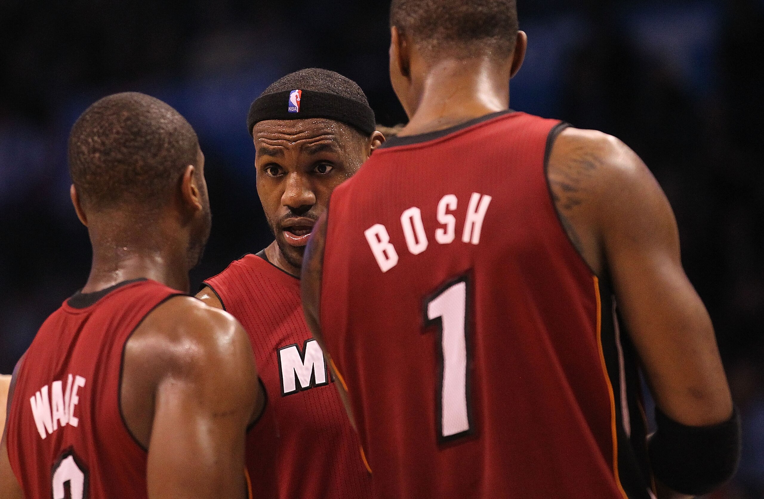 OKLAHOMA CITY, OK - JANUARY 30: Forward LeBron James #6 talks with Dwyane Wade #3 and Chris Bosh #1 of the Miami Heat during play against the Oklahoma City Thunder at Ford Center on January 30, 2011 in Oklahoma City, Oklahoma. NOTE TO USER: User express OKLAHOMA CITY, OK - JANUARY 30: Forward LeBron James #6 talks with Dwyane Wade #3 and Chris Bosh #1 of the Miami Heat during play against the Oklahoma City Thunder at Ford Center on January 30, 2011 in Oklahoma City, Oklahoma. NOTE TO USER: User express