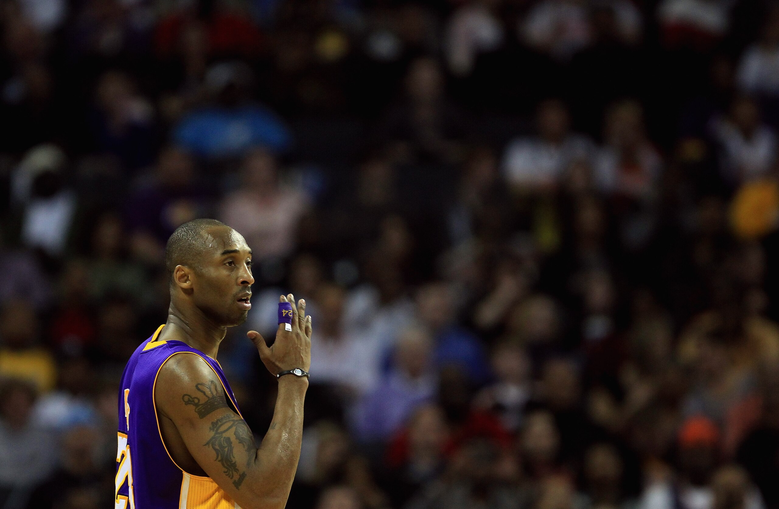 CHARLOTTE, NC - FEBRUARY 14: Kobe Bryant #24 of the Los Angeles Lakers reacts to his bench against the Charlotte Bobcats during their game at Time Warner Cable Arena on February 14, 2011 in Charlotte, North Carolina. NOTE TO USER: User expressly acknowle CHARLOTTE, NC - FEBRUARY 14: Kobe Bryant #24 of the Los Angeles Lakers reacts to his bench against the Charlotte Bobcats during their game at Time Warner Cable Arena on February 14, 2011 in Charlotte, North Carolina. NOTE TO USER: User expressly acknowle