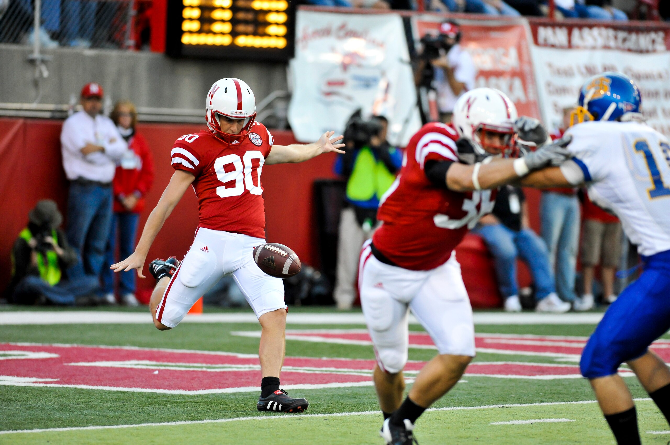 LINCOLN, NEBRASKA - SEPTEMBER 25: Nebraska Cornhuskers kicker Alex Henery #90 punts the ball away during first half action of their game at Memorial Stadium on September 25, 2010 in Lincoln, Nebraska. Nebraska Defeated South Dakota State 17-3. (Photo by E