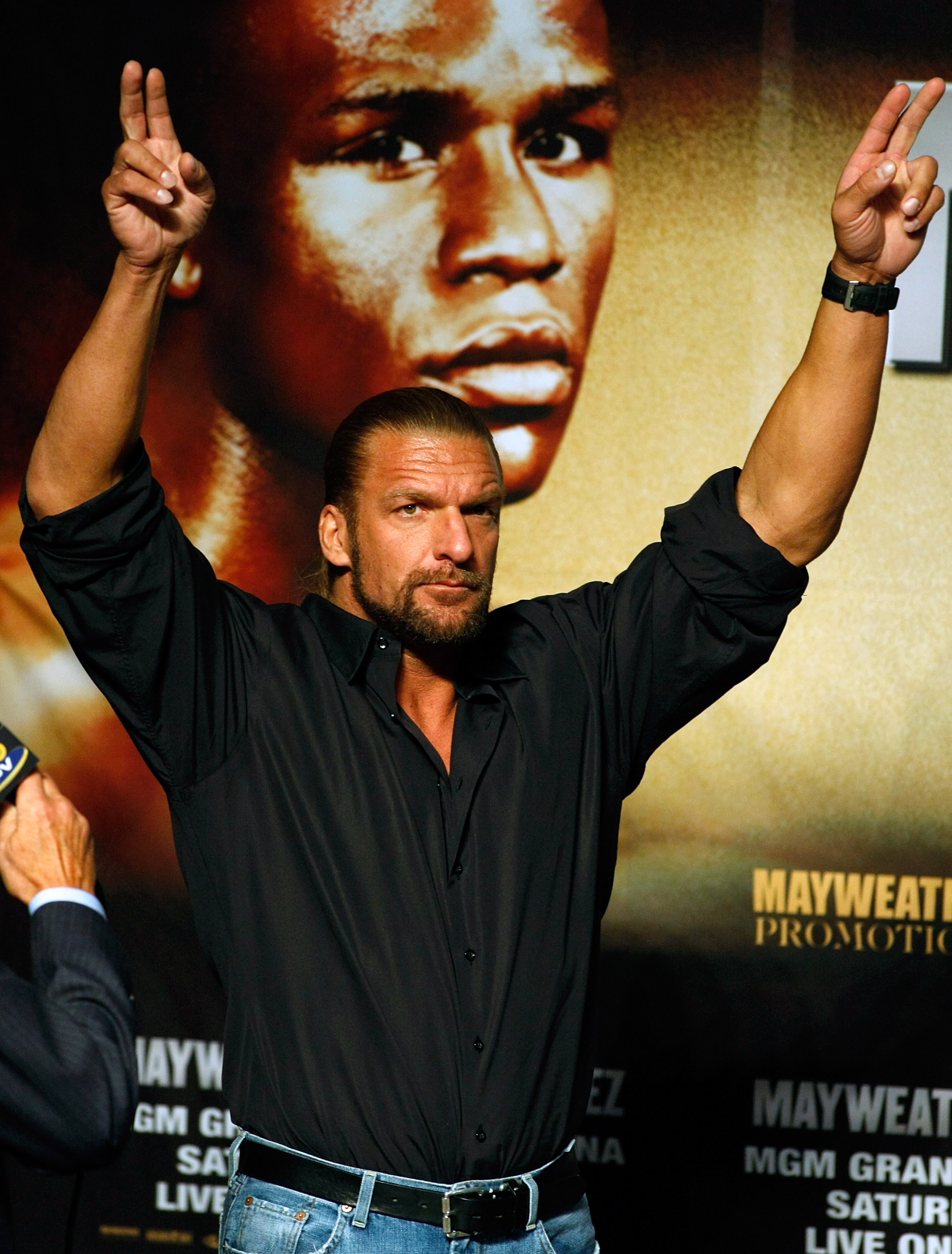LAS VEGAS - SEPTEMBER 18: WWE wrestler Triple H attends the official weigh-in for boxers Floyd Mayweather Jr. and Juan Manuel Marquez at the MGM Grand Garden Arena September 18, 2009 in Las Vegas, Nevada. The two will fight at the MGM on September 19. ( LAS VEGAS - SEPTEMBER 18: WWE wrestler Triple H attends the official weigh-in for boxers Floyd Mayweather Jr. and Juan Manuel Marquez at the MGM Grand Garden Arena September 18, 2009 in Las Vegas, Nevada. The two will fight at the MGM on September 19. (