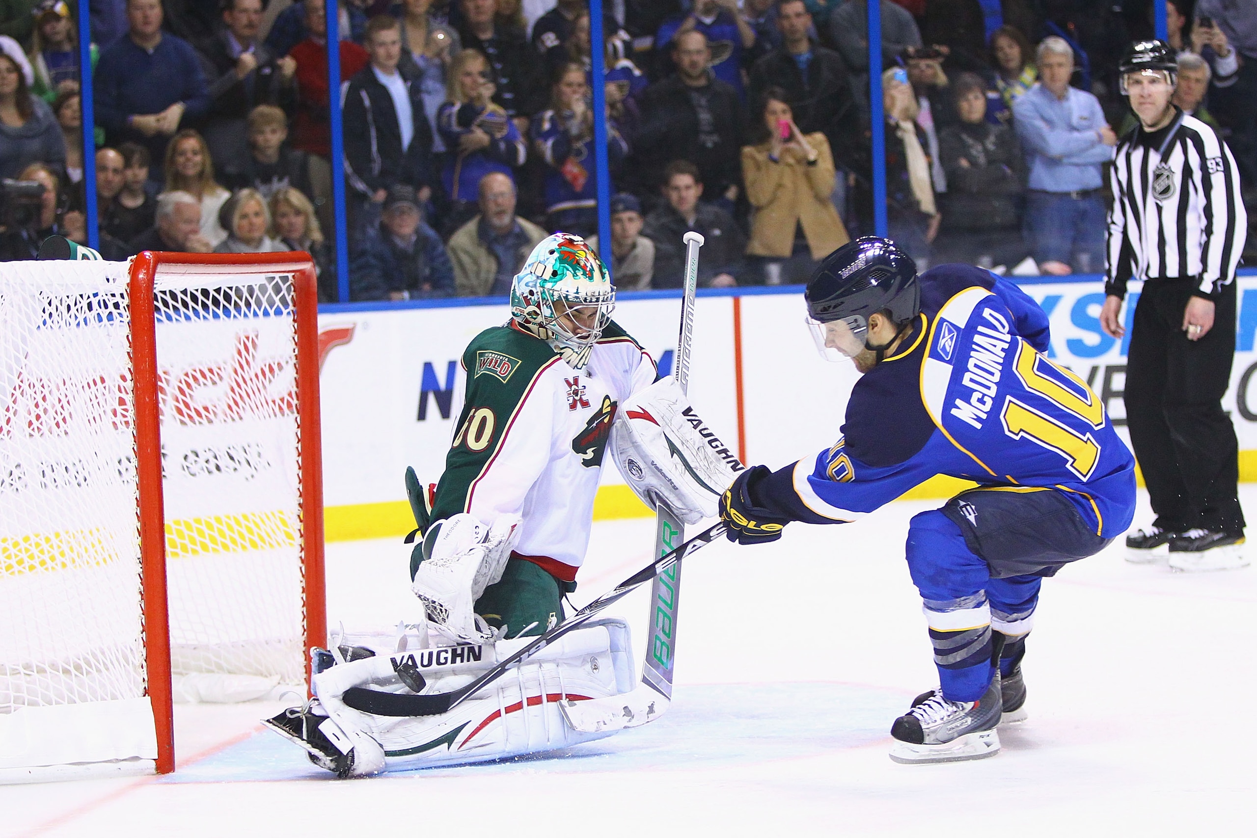 ST. LOUIS, MO - FEBRUARY 11: Jose Theodore #60 of the Minnesota Wild makes a save against Andy McDonald #10 of the St. Louis Blues during a shootout at the Scottrade Center on February 11, 2011 in St. Louis, Missouri.  The Wild won 5-4 in a shootout.  (Ph