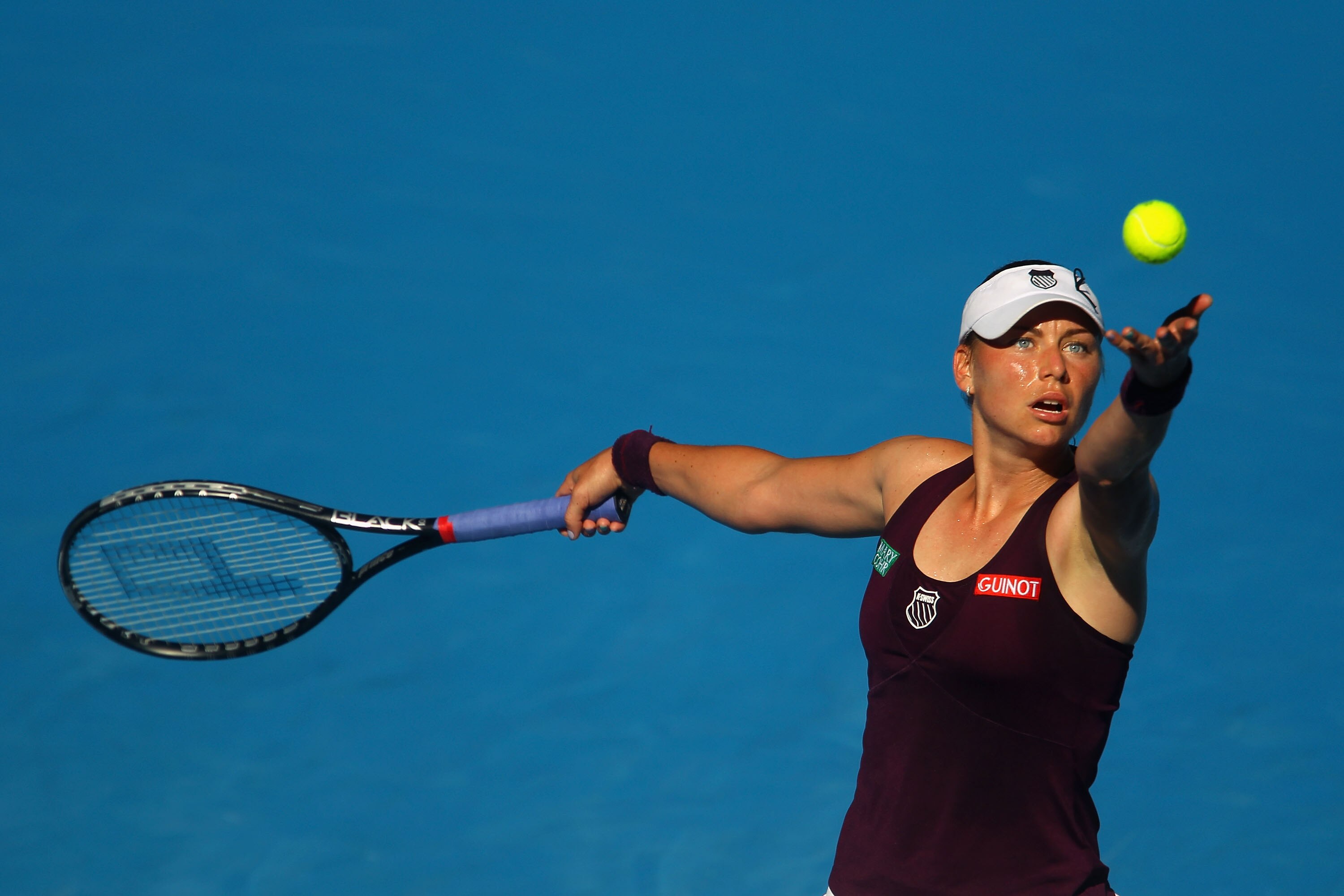 MELBOURNE, AUSTRALIA - JANUARY 27:  Vera Zvonareva of Russia serves in her semifinal match against Kim Clijsters of Belgiumduring day eleven of the 2011 Australian Open at Melbourne Park on January 27, 2011 in Melbourne, Australia.  (Photo by Julian Finne