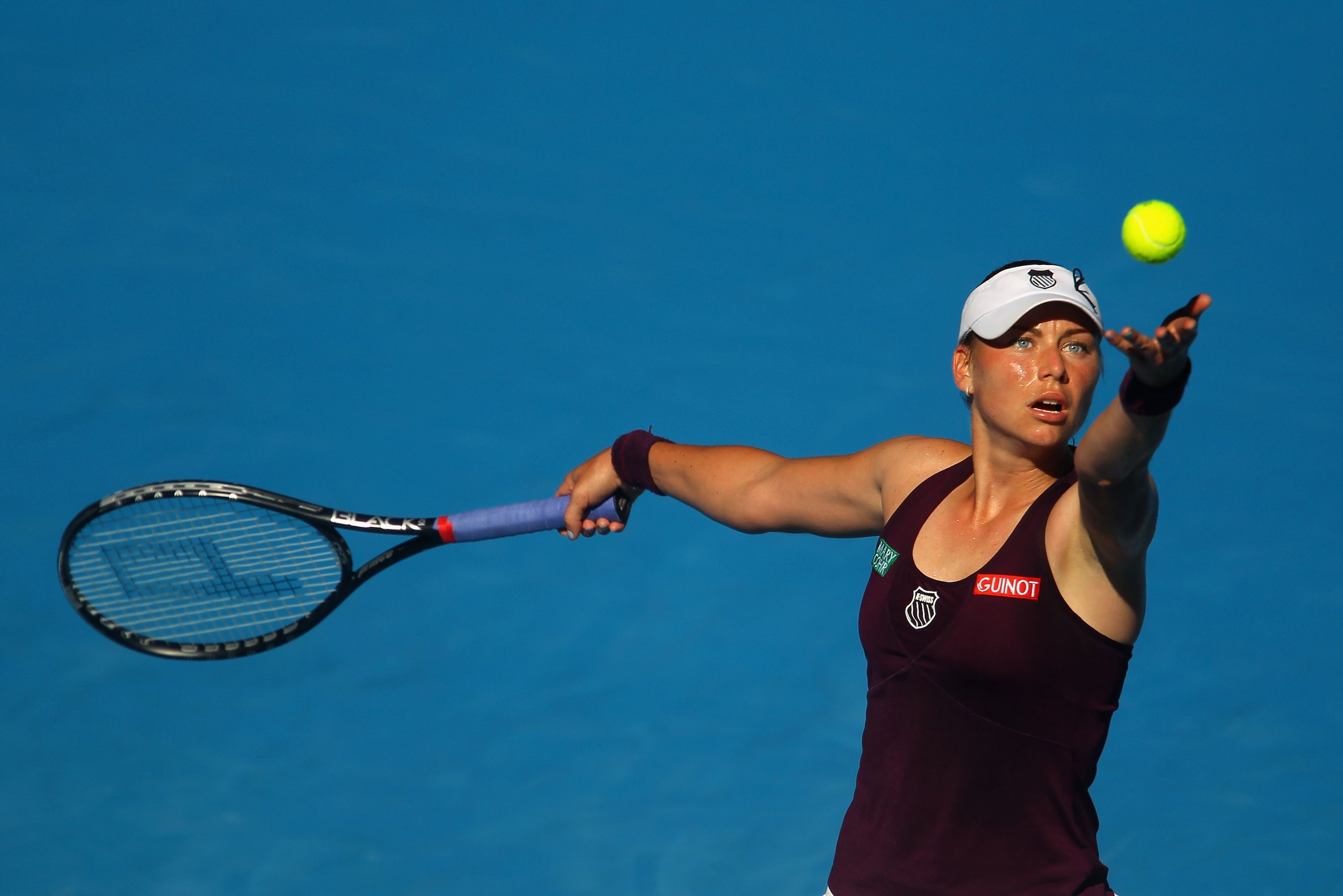 MELBOURNE, AUSTRALIA - JANUARY 27:  Vera Zvonareva of Russia serves in her semifinal match against Kim Clijsters of Belgiumduring day eleven of the 2011 Australian Open at Melbourne Park on January 27, 2011 in Melbourne, Australia.  (Photo by Julian Finne