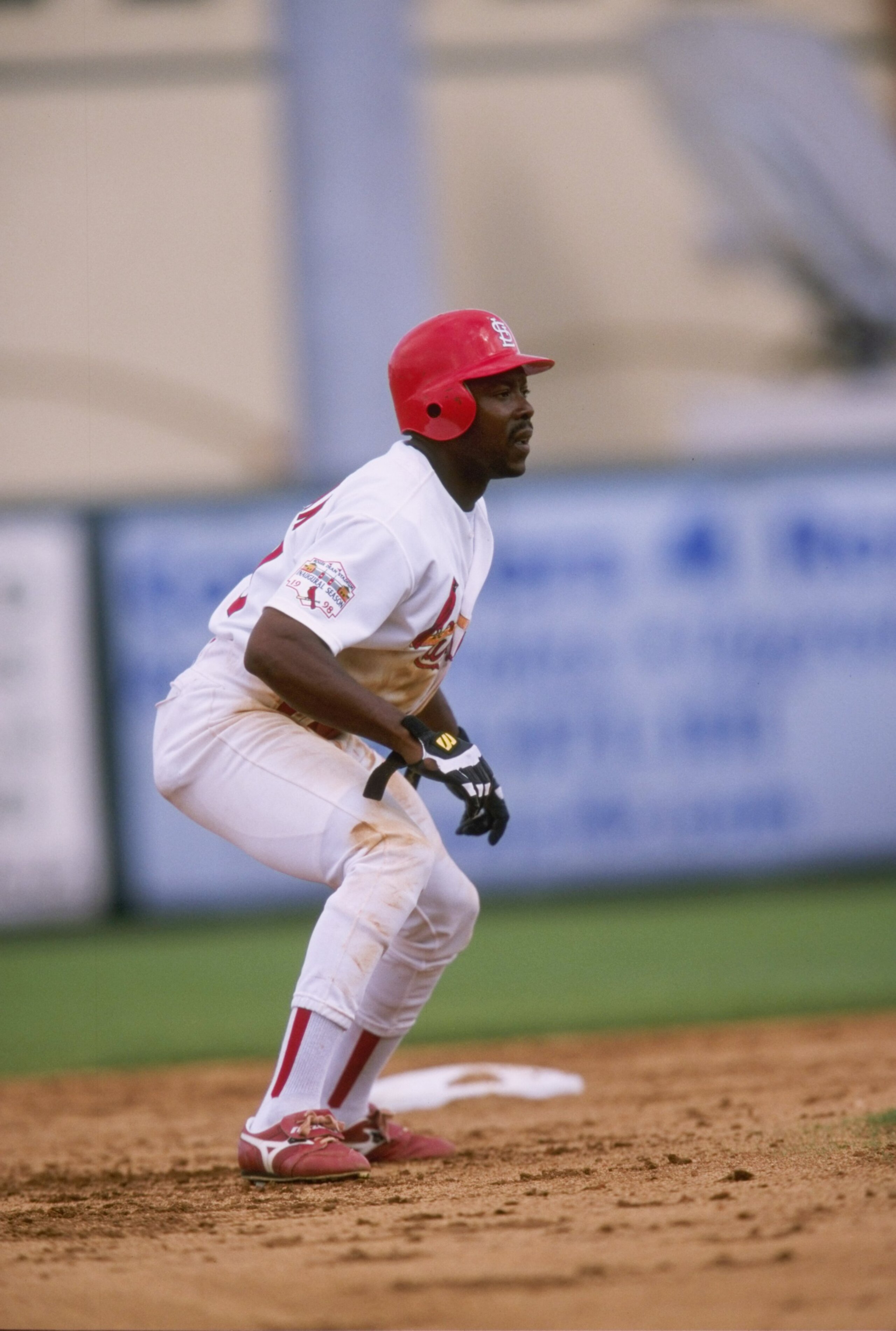 8 Mar 1998:  Vince Coleman of the St. Louis Cardinals tries to tag out Reed Secrist of the New York Mets during a spring training at the Roger Dean Stadium in Jupiter, Florida. The Mets defeated the Cardinals 5-4. Mandatory Credit: Stephen Dunn  /Allsport