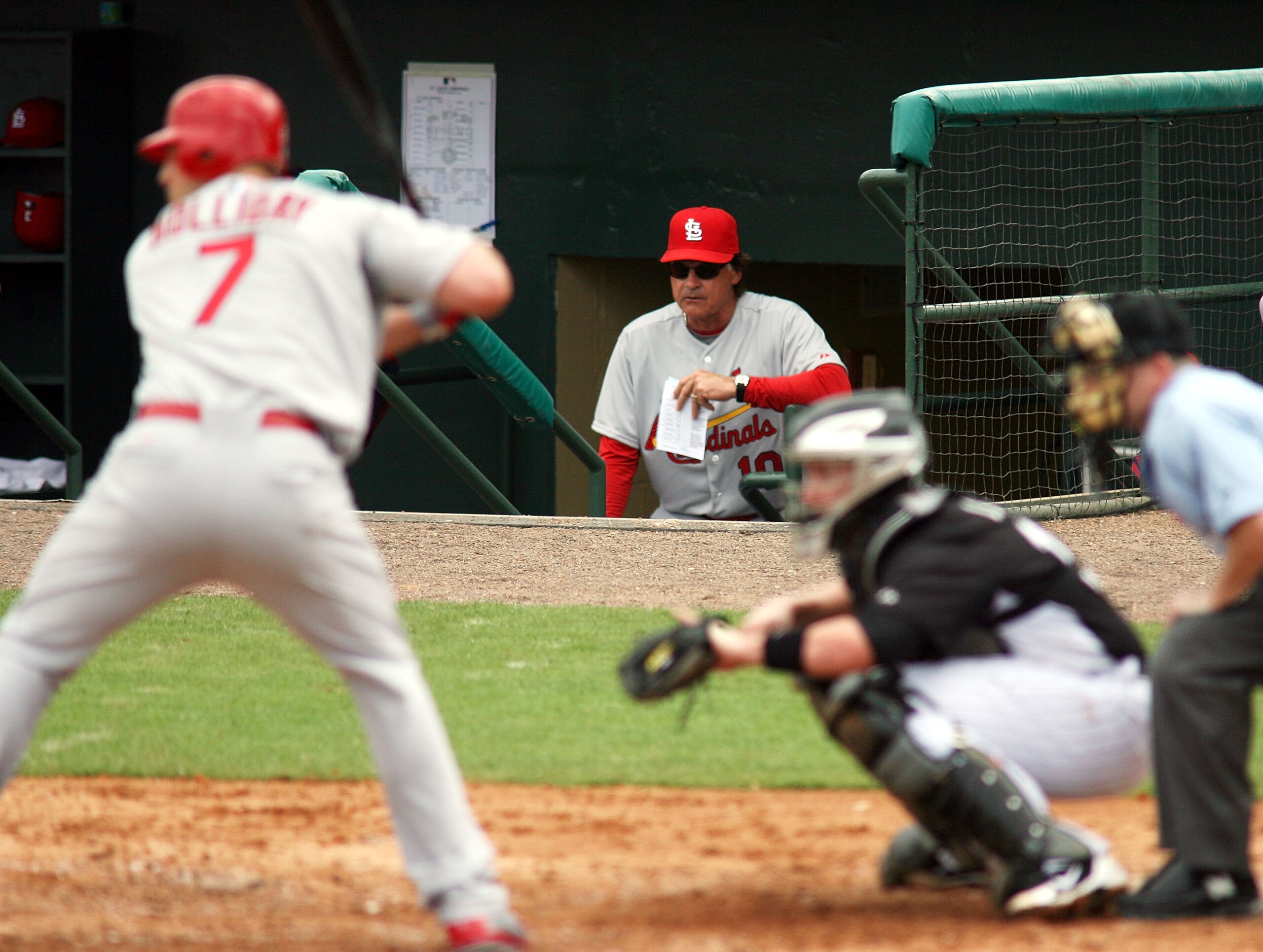 JUPITER, FL - MARCH 01:  Manager Tony La Russa of the St. Louis Cardinals watches his team against the Florida Marlins at Roger Dean Stadium on March 1, 2011 in Jupiter, Florida.  (Photo by Marc Serota/Getty Images)