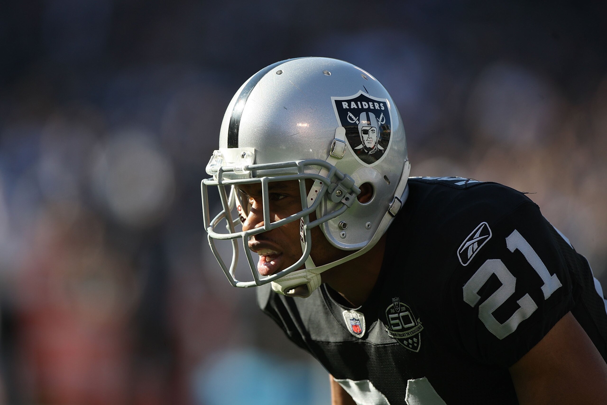 OAKLAND, CA - JANUARY 03: Nnamdi Asomugha #21 of the Oakland Raiders in action against the Baltimore Ravens during an NFL game at Oakland-Alameda County Coliseum on January 3, 2010 in Oakland, California. (Photo by Jed Jacobsohn/Getty Images) OAKLAND, CA - JANUARY 03: Nnamdi Asomugha #21 of the Oakland Raiders in action against the Baltimore Ravens during an NFL game at Oakland-Alameda County Coliseum on January 3, 2010 in Oakland, California. (Photo by Jed Jacobsohn/Getty Images)