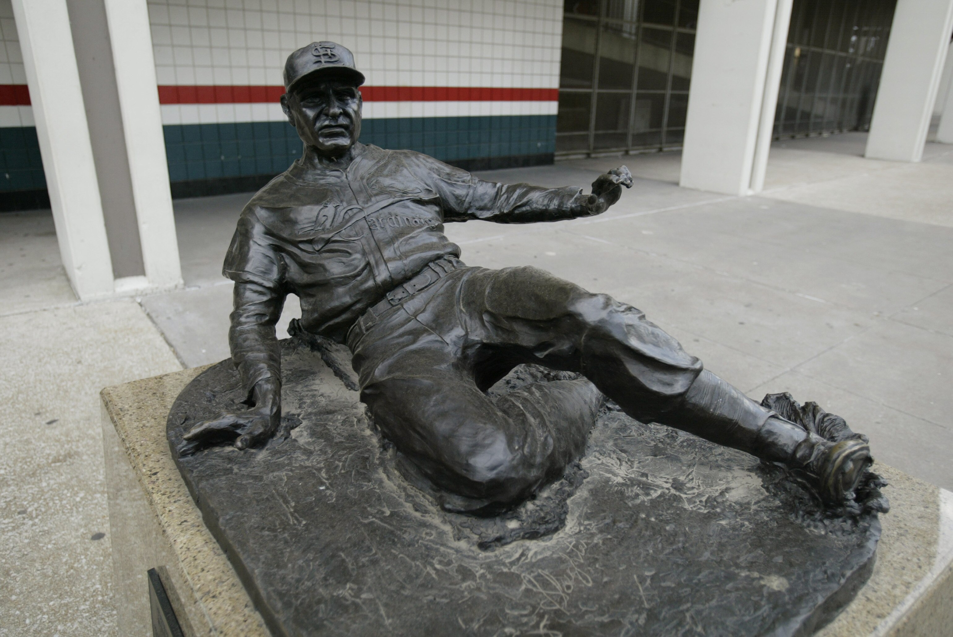 ST LOUIS - JULY 18:  Statue of Enos Slaughter #9 of the St. Louis Cardinals is outside of Busch Stadium on July 18, 2004 in St. Louis, Missouri. (Photo by Dilip Vishwanat/Getty Images)