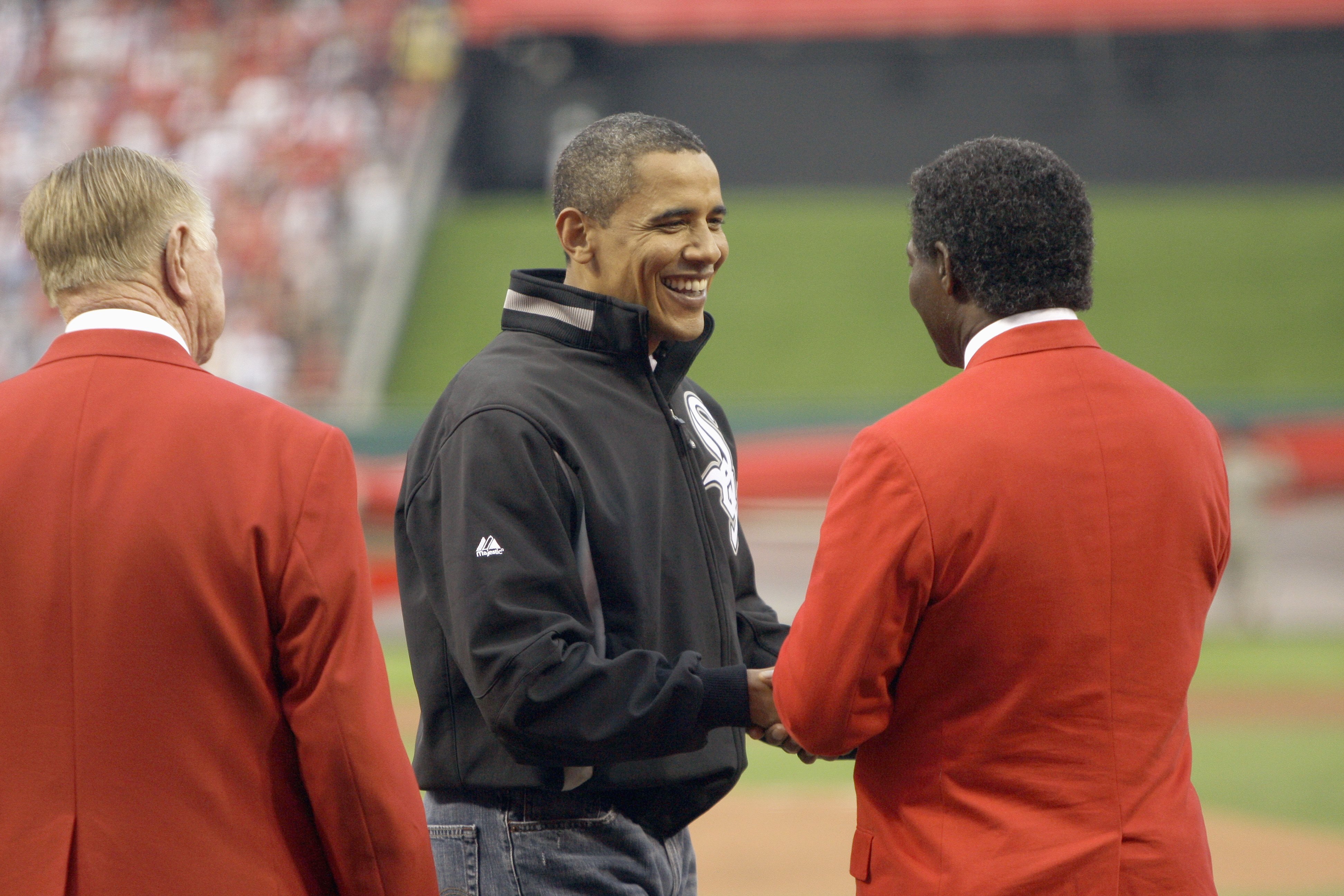 ST LOUIS, MO - JULY 14: U.S. President Barack Obama greets Hall of Famer Lou Brock after throwing out the first pitch at the 2009 MLB All-Star Game at Busch Stadium on July 14, 2009 in St Louis, Missouri. (Photo by Pool/Getty Images)