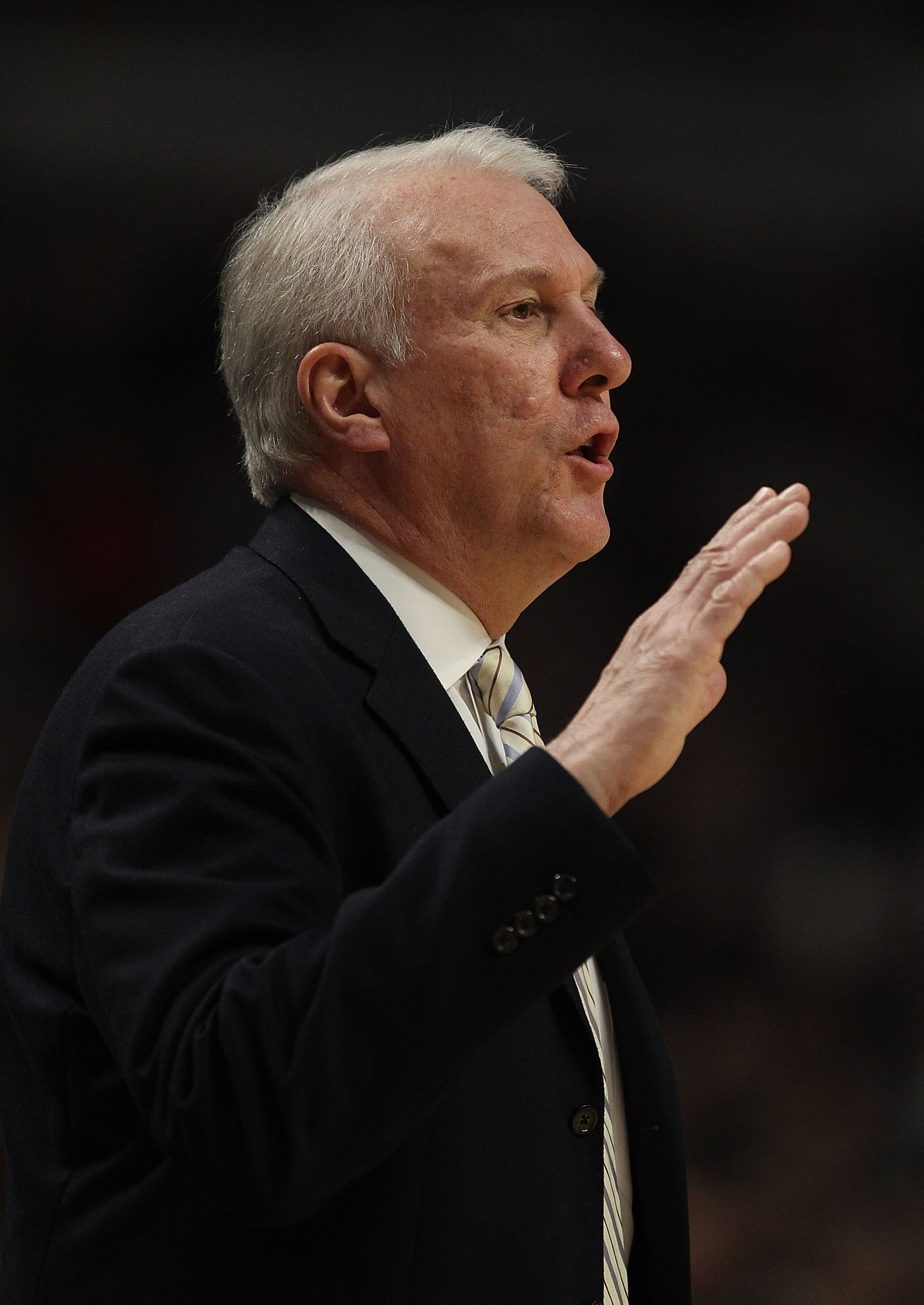 CHICAGO, IL - FEBRUARY 17: Head coach Gregg Popovich of the San Antonio Spurs gives instructions to his team during a game against the Chicago Bulls at the United Center on February 17, 2011 in Chicago, Illinois. The Bulls defeated the Spurs 109-99. NOTE