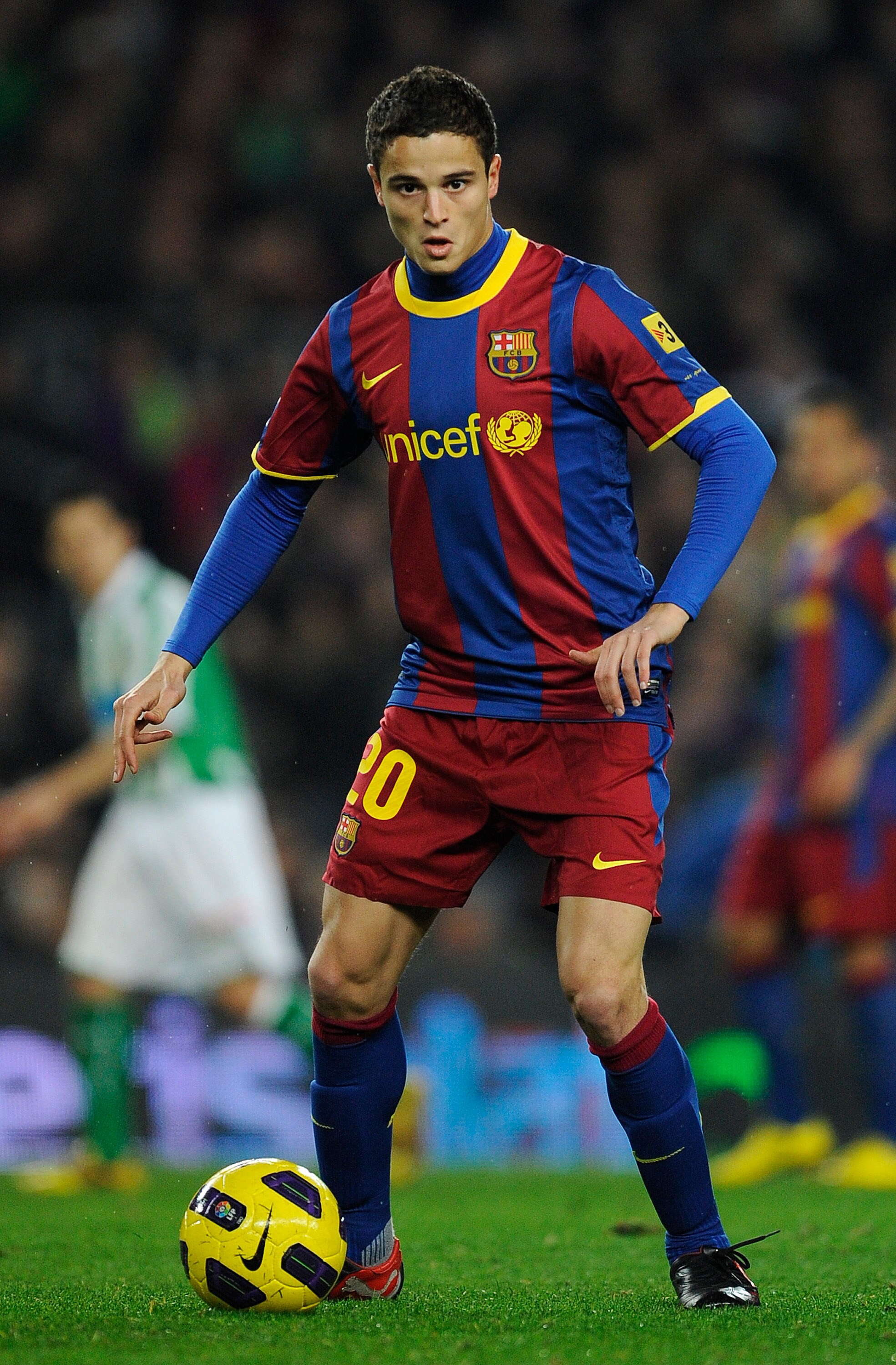 BARCELONA, SPAIN - JANUARY 12:  Ibrahim Afellay of FC Barcelona runs with the ball during the Copa del Rey quarter final first leg match between FC Barcelona and Betis at Camp Nou on January 12, 2011 in Barcelona, Spain. Barcelona won 5-0.  (Photo by Davi