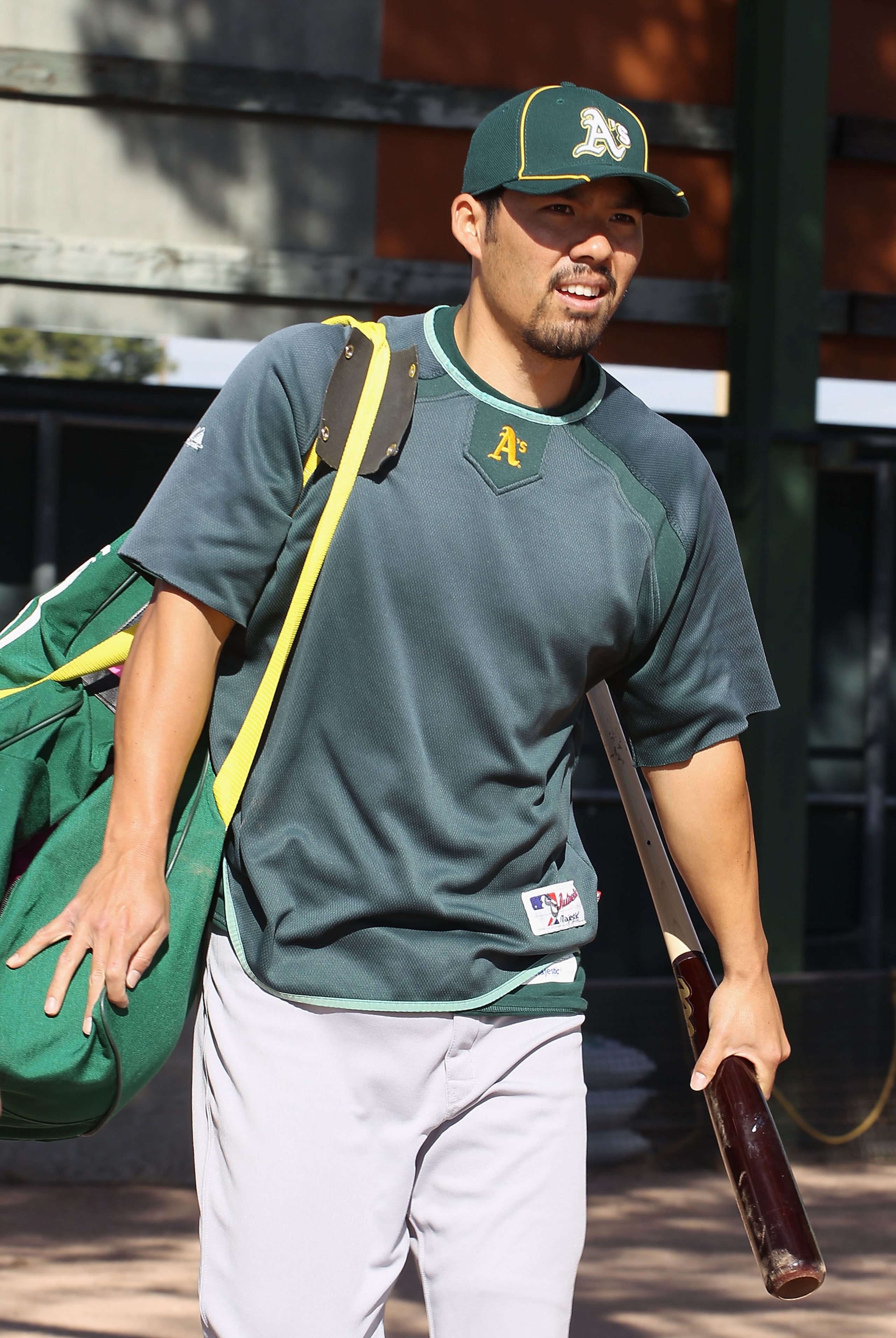 PHOENIX, AZ - FEBRUARY 16:  Kurt Suzuki #8 of the Oakland Athletics arrives to a MLB spring training practice at Phoenix Municipal Stadium on February 16, 2011 in Phoenix, Arizona.  (Photo by Christian Petersen/Getty Images)
