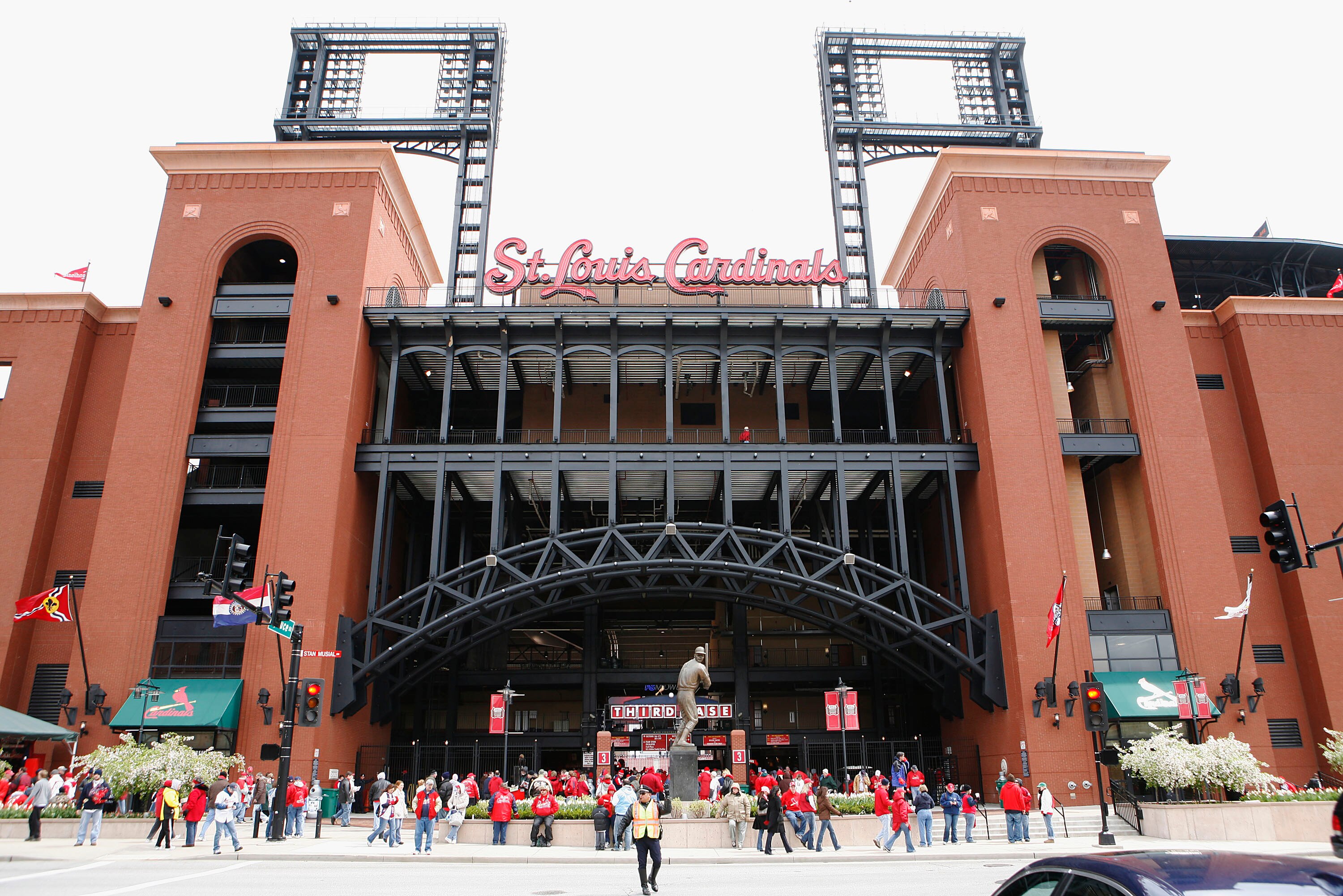 ST. LOUIS, MISSOURI - APRIL 6: Fans stand outside Busch Stadium prior to the opening day game between the St. Louis Cardinals and the Pittsburgh Pirates at Busch Stadium April 6, 2009 in St. Louis, Missouri.  (Photo by Dilip Vishwanat/Getty Images)