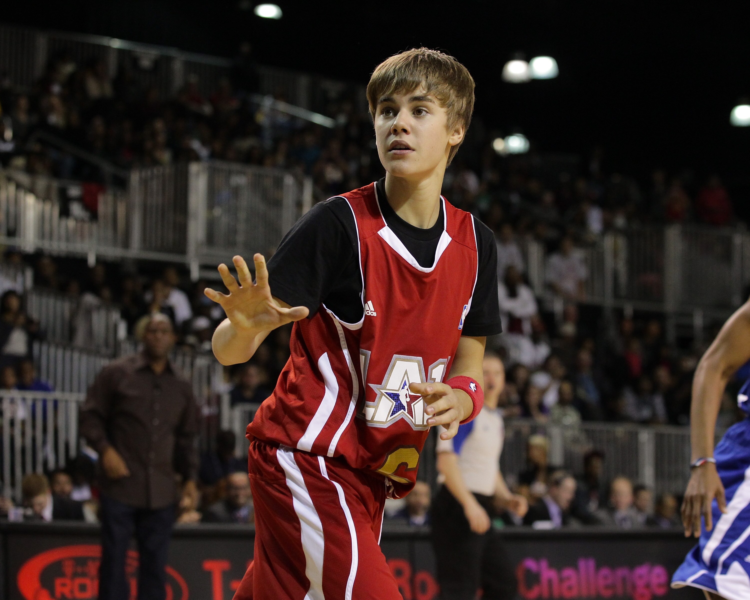 LOS ANGELES, CA - FEBRUARY 18:  Justin Bieber plays at the 2011 BBVA NBA All-Star Celebrity Game at the Los Angeles Convention Center on February 18, 2011 in Los Angeles, California.  (Photo by Noel Vasquez/Getty Images)