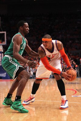 NEW YORK, NY - APRIL 24:  Carmelo Anthony #7 of the New York Knicks looks to pass against Jeff Green #8 of the Boston Celtics in Game Four of the Eastern Conference Quarterfinals during the 2011 NBA Playoffs on April 24, 2011 at Madison Square Garden in N